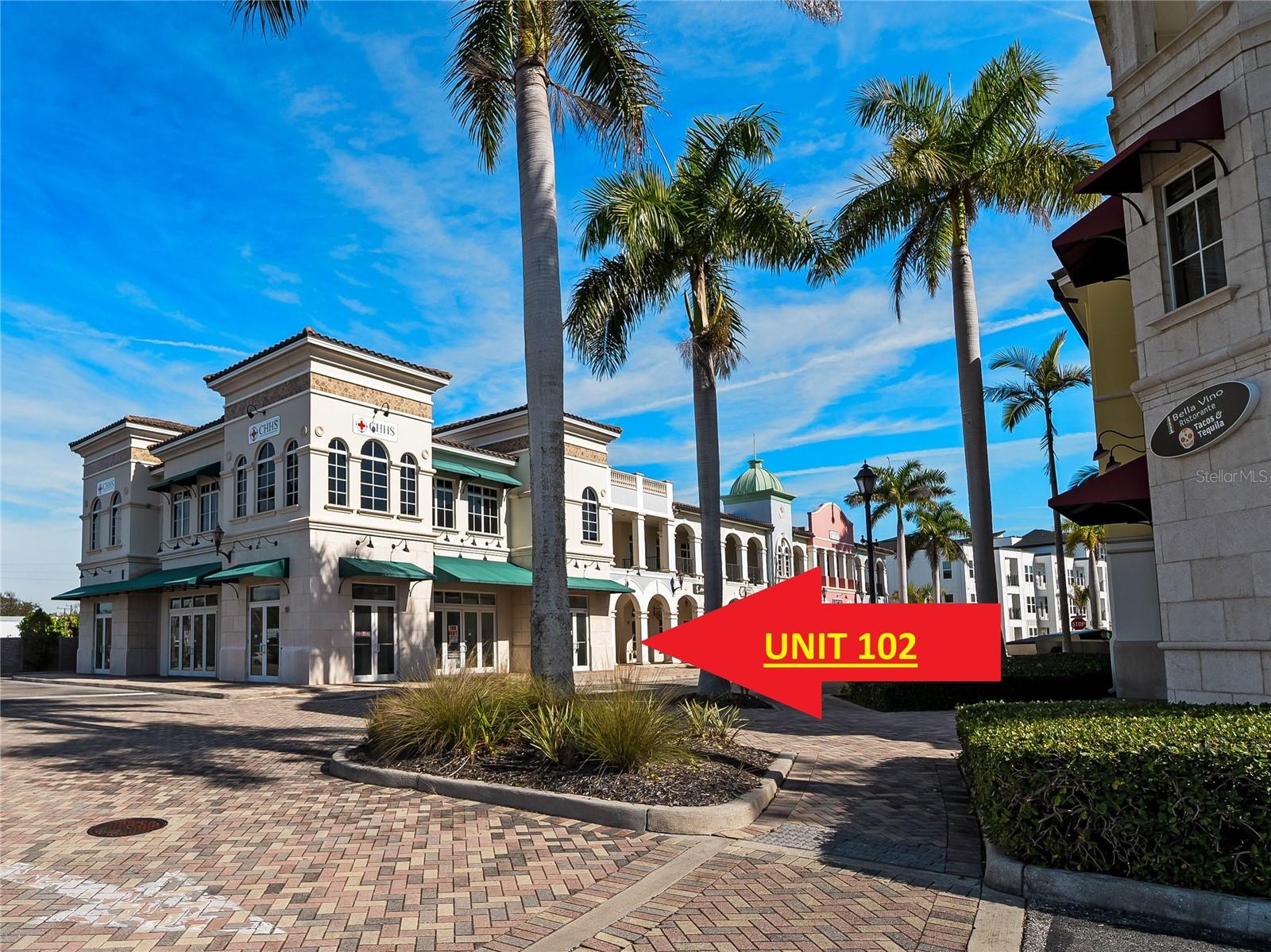 ANOTHER REDUCTION! NOW $439,000! Bigger Price Improvement! Seller is ready to make a deal!  EXCEPTIONAL OPPORTUNITY to OWN & GROW YOUR BUSINESS in an UP-SCALE WATERFRONT WALKING COMMUNITY! First-floor retail-office condominium in the highly regarded Bay Street Commercial Condominium, located in Osprey’s Bayfront Village—one of Sarasota County’s fastest-growing waterfront walking communities. This turn-key, beautifully built-out space is designed to accommodate a wide range of professional uses, including medical, professional services, retail, and boutique office operations. Perfectly positioned for long-term success, the property is set to benefit from significant foot traffic, with approximately 252 luxury multifamily apartment residences currently developed directly behind the town center. The location is further enhanced by close proximity to affluent communities such as The Oaks and nearby luxury bayfront estates, all just minutes away. Inside, the meticulously designed layout features soaring ceilings that create a refined sense of openness and sophistication. No expense was spared in the high-end build-out, with substantial investment dedicated to crafting a luxurious, private, and highly functional professional environment. The thoughtfully designed floor plan includes six private offices, two conference rooms, a bright, professionally appointed lobby with a welcoming reception area, two well-appointed bathrooms, and a convenient kitchenette. Each office is constructed with soundproofed walls and solid hardwood doors, ensuring privacy, comfort, and quiet productivity. Upscale lighting, premium flooring, and modern finishes elevate the space throughout, reinforcing its contemporary, high-end appeal. A rear door provides direct access to ample employee parking, offering convenience and ease for staff. The property also features a charming front porch that may serve as a welcoming seating area with potted plants, a coffee table, and comfortable seating, creating a warm and inviting, home-like first impression for clients, patients, or guests. Ideal for medical, professional, or boutique office use, this property presents a rare opportunity to establish or expand your business within a high-end commercial complex poised for continued growth and long-term value. See attached Feature Lists for additional details about the community and Unit 201.