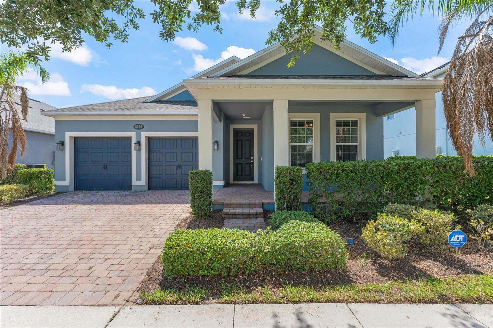 **This house comes with a REDUCED RATE through the seller's preferred lender. This is a lender-paid rate buydown that reduces the buyer's interest rate and monthly payment.**

Welcome to 8266 Purple Sandpiper Avenue in Winter Garden. This 4 bedroom, 3 bath home features a comfortable layout and plenty of space to fit different lifestyles. Inside you'll find an open living area that brings the kitchen, dining, and family room together making it easy to spend time with family or entertain guests. The kitchen overlooks the main living space, giving the home an open and connected feel.

The home also features new flooring, newly added custom closet built-ins that provide both style and extra organization, fully paid-off solar panels for energy efficiency and long-term savings and a dedicated EV charging outlet in the garage for added convenience.

With 4 bedrooms and 3 full bathrooms, this home offers flexibility for guests, a home office, or a growing household.

The outdoor spaces are just as inviting. The covered front porch creates a welcoming first impression, while the screened back patio offers a great spot to enjoy morning coffee, outdoor meals, or relaxing in the shade.

The community offers a wide range of amenities as well, including a pool, clubhouse, fitness center, playground, tennis court, and lake access. These features give residents convenient options for recreation, exercise, and time outdoors close to home.

Located in Winter Garden, the home is set within a sought-after Central Florida area known for its growing mix of shopping, dining, parks, trails, and community conveniences. Residents enjoy access to nearby schools, local retail, major roadways, and popular destinations throughout Winter Garden and the greater Orlando area.
