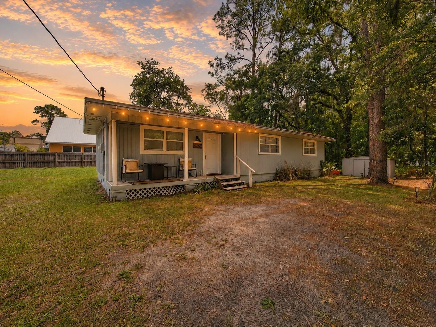 Virtually Staged. Fully updated and move-in ready, this 3-bedroom, 2-bathroom single-family home sits on a quiet cul-de-sac lot just under a quarter acre in Gainesville. At 1,091 square feet with an open floor plan, the home lives larger than its footprint suggests, with thoughtful renovations throughout that give it a fresh, modern feel from the moment you walk in.

Inside, luxury vinyl flooring runs throughout the home, tying together a bright and open living space filled with natural light. The kitchen has been completely updated with white shaker cabinetry, stainless steel appliances including a French door refrigerator, range, dishwasher, and microwave, and clean finishes that make the space both functional and visually appealing. The layout flows seamlessly from the kitchen into the living area, making it an ideal setup for everyday living and entertaining. The washer and dryer are included as well.

Both bathrooms have been tastefully renovated with modern vanities, updated fixtures, and fresh tile work. All three bedrooms are generously sized, offering flexibility for a primary suite, guest room, home office, or whatever suits the next owner's needs. Each bedroom features built-in closets, and ceiling fans are installed throughout. The roof was replaced in 2020 and the AC system was replaced in 2021, giving future owners additional peace of mind. 

Outside, the fenced yard offers privacy and plenty of room to enjoy the outdoors, entertain, or let pets roam freely. The property is shaded by mature trees that give the lot a peaceful, tucked-away feel while still being conveniently located in Gainesville with easy access to shopping, dining, and major corridors.