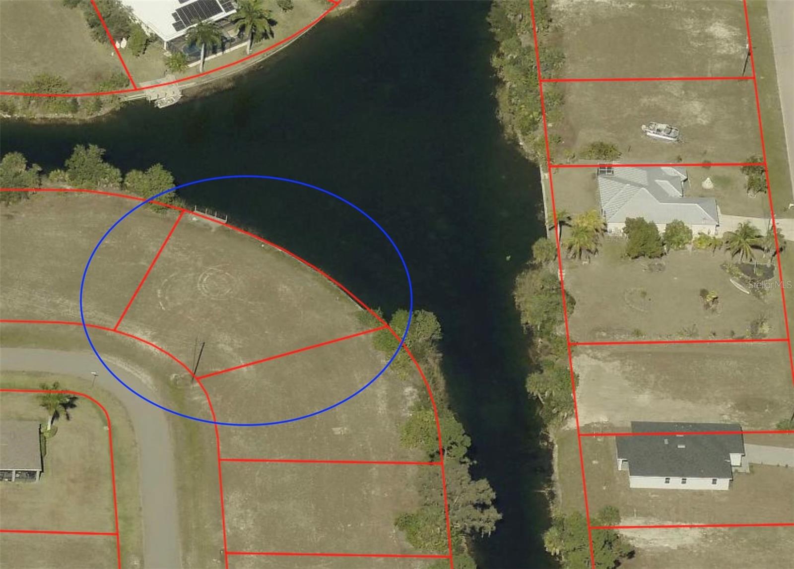 Welcome to 1133 NE 32nd Terrace in beautiful Cape Coral, Florida — a rare X FLOOD ZONE waterfront homesite featuring breathtaking wide water views from this premium tip lot location.

This property offers the ultimate Southwest Florida lifestyle with a 152' of concrete seawall and a concrete boat dock already in place, making it ready for boating, fishing, and sunset cruising right from your backyard.

Enjoy expansive intersecting canal views on the Bonnie and Shapiro Canals that create an open water feel, along with extra privacy and nature views only a tip lot like this can provide. Whether you're planning to build your dream waterfront home or invest in one of Cape Coral’s boating-friendly communities with No HOA, this property checks all the boxes. 

Imagine relaxing poolside while taking in panoramic water views, watching fish jump and birds flying by...decompress after long days or escape from cold winters. This and so much more from your own backyard.

Opportunities like this are becoming harder to find — especially with wide water views, an improved tip lot with seawall and boat dock already in place, and X Flood Zone. WOW!

Schedule your private showing today and experience the best of Cape Coral waterfront living.