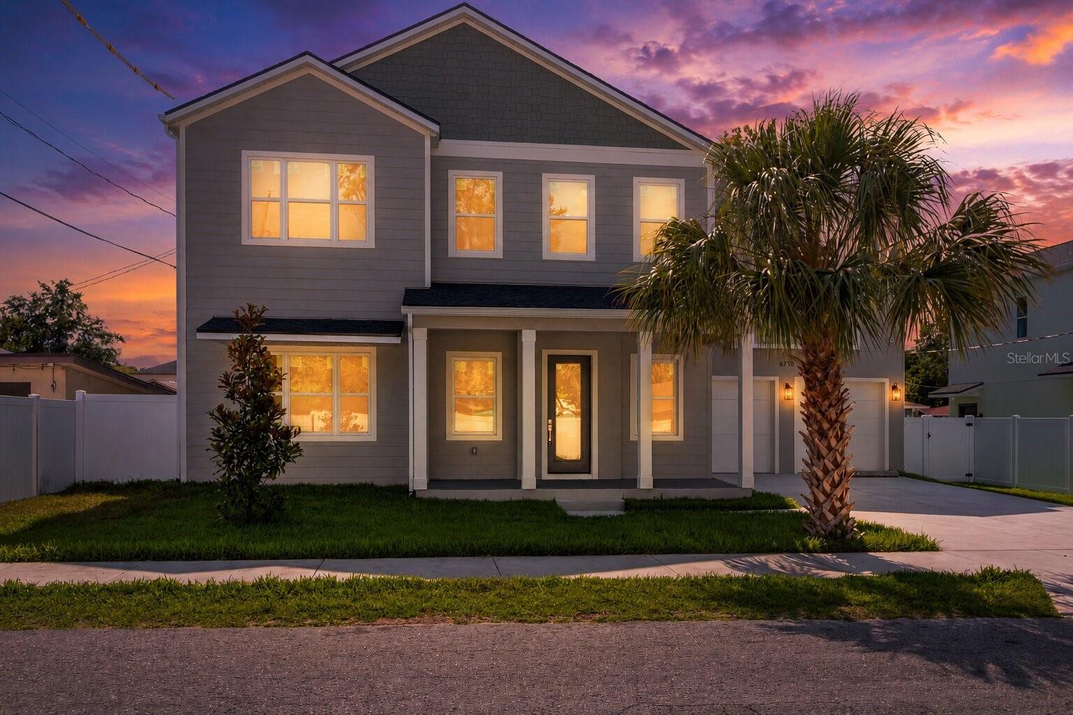 Experience the perfect blend of timeless Craftsman charm and modern luxury in this stunning brand-new home located in the heart of Seminole Heights. Offering 4 bedrooms, a loft, 3.5 bathrooms, and a spacious 2-car garage, this thoughtfully designed residence features two private primary suites - one conveniently located on the first floor and another upstairs - making it ideal for multigenerational living or hosting guests. Step inside to a light-filled living space where soaring two-story cathedral ceilings create a dramatic yet welcoming atmosphere. Luxury vinyl plank flooring flows seamlessly throughout the entire home, combining style with durability. The open-concept layout is designed for both everyday living and effortless entertaining. The home is equipped with impact-rated windows and doors, providing enhanced storm protection, energy efficiency, improved security, and noise reduction. Outside, the fully fenced backyard offers the perfect space for pets, play, or relaxing in your own private outdoor retreat. Adding even greater value, this home includes a comprehensive 1-2-10 builder warranty, featuring one year of workmanship coverage, two years of major systems protection, and ten years of structural coverage, allowing you to enjoy your new home with confidence for years to come. Ideally situated in one of Tampa's most sought-after historic neighborhoods, you'll enjoy easy access to Seminole Heights' vibrant dining scene, local breweries, parks, downtown Tampa, and everything this thriving community has to offer. Don't miss the opportunity to own a beautifully crafted new construction home in an unbeatable location.