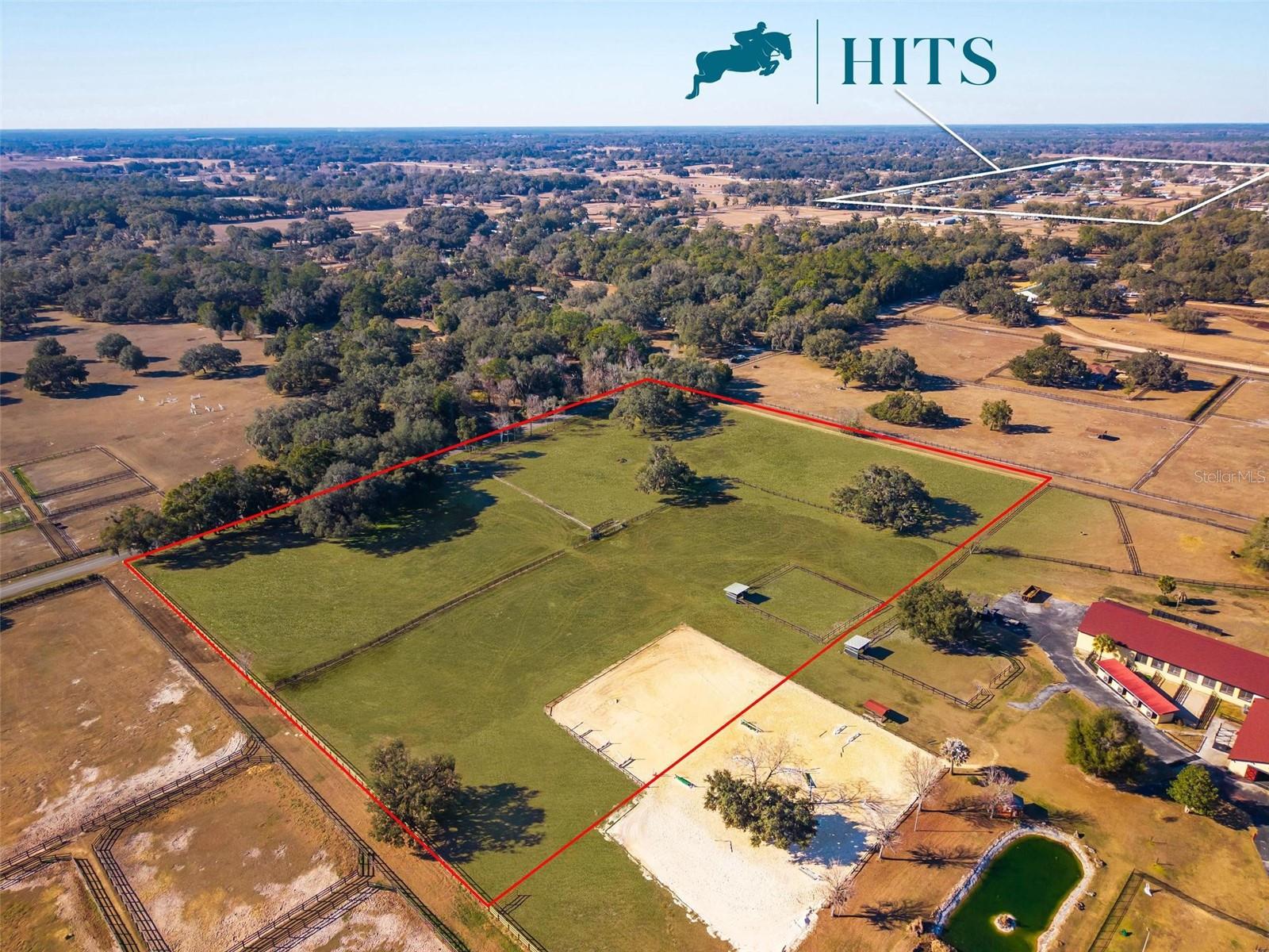 Price adjustment! 10 ACRES vacant land only 1/2 MILE south from HITS Stadium and Showgrounds.  The property is in Pinnacle Park but has direct access into the land from NW 137th AV. Brand new perimeter fence around 3 sides. Property has some nice building sites for a house, a barn, barndominium, or all the of these. The property has a 12x15 horse shed with 100x100 (approx) paddock fencing. The sand ring/ arena is approximately 110x 150 and can easily be expanded.  LOCATION, LOCATION, LOCATION. Cattle may be roaming the property so the gate may be locked. Photos digitally enhanced to show green grass.