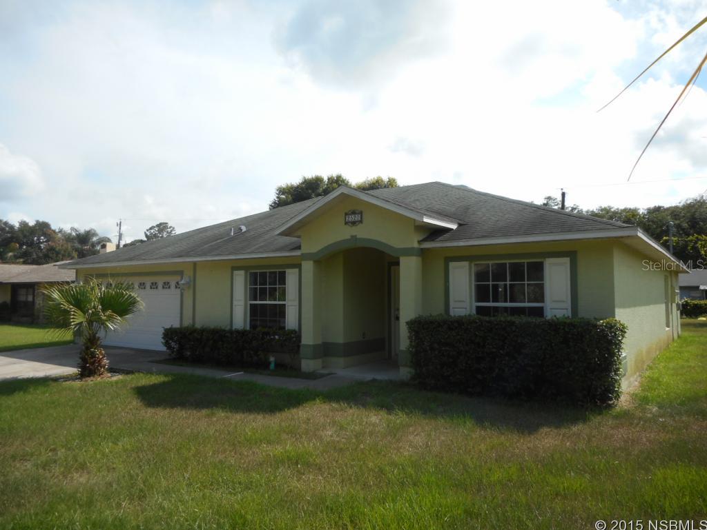 Built in 2006, this great 4 bedroom, 2 bath contemporary stucco block home is centrally located area of Florida Shores. This home is close to everything including shopping off of Indian River Blvd (442) and a short distance to I-95 to go where your heart desires. The beach is within 15 minutes north in New Smyrna Beach and the river within 5 minutes for great exploring. This home boasts a very open floor plan with great planter shelves, eat-in kitchen with breakfast bar and fantastic split plan with tile floors in the foyer, kitchen, baths and living/dining combo. The master suite has a large walk-in closet, private bath with great sit-in vanity, stand-up shower and convenient linen closet. Enjoy your private back yard with mature landscaping behind. This is a Fannie Mae HomePath property! ;Water: City