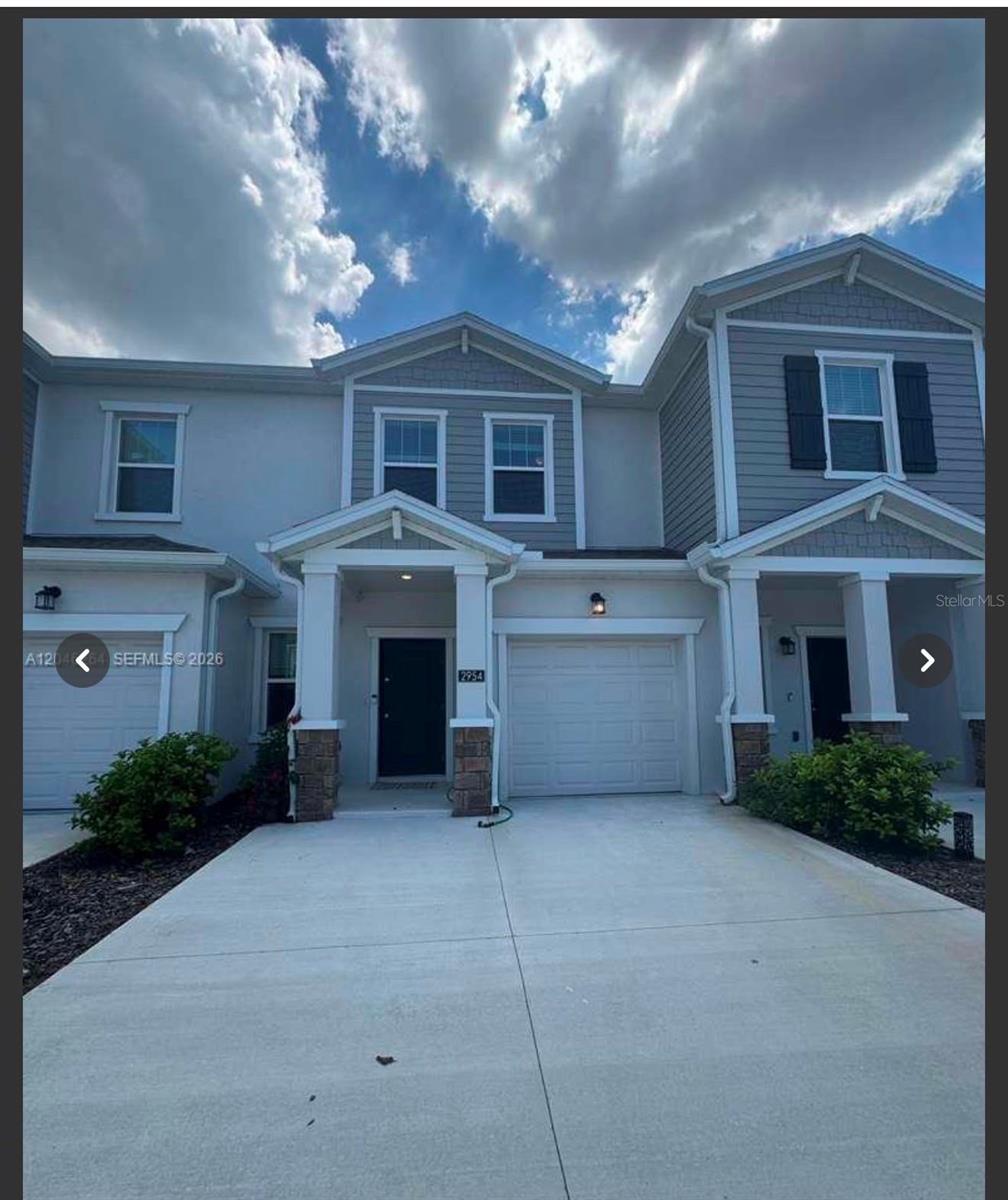 Virtually Staged. **Beautiful Like-New Townhome Built in 2024 – Move-In Ready!**

Welcome to this stunning two-story townhome, built in 2024 and thoughtfully designed with a modern open-concept floor plan that perfectly blends style, comfort, and functionality. This move-in-ready home features **3 spacious bedrooms, 2 full bathrooms, and 1 half bathroom**, making it ideal for families, professionals, or anyone looking for a low-maintenance lifestyle.

The first floor offers a bright and inviting living and dining area with sliding glass doors that open to the outdoor space, creating a seamless indoor-outdoor flow perfect for relaxing or entertaining. The modern kitchen comes fully equipped with essential appliances, beautiful wood cabinetry, generous counter space, and plenty of storage, making it the perfect place to prepare meals and gather with family and friends.

Upstairs, you'll find all three bedrooms, including a private owner's suite designed for comfort and relaxation. The primary suite features a spa-inspired ensuite bathroom and a spacious walk-in closet, providing the perfect retreat at the end of the day.

Located in the highly desirable **Chateau at Astonia** community in Davenport, this home is just minutes from **Posner Park**, offering a wide variety of shopping, dining, and entertainment options. With convenient access to **Interstate 4**, you'll be within easy reach of Orlando's world-famous theme parks, premier golf courses, and countless outdoor attractions.

Residents enjoy outstanding community amenities, including:

* Resort-style swimming pool
* Playground
* Dog park
* Beautiful recreational and green spaces

Don't miss this incredible opportunity to own a like-new home in one of Central Florida's fastest-growing and most desirable communities. Schedule your private showing today and make this beautiful home yours!