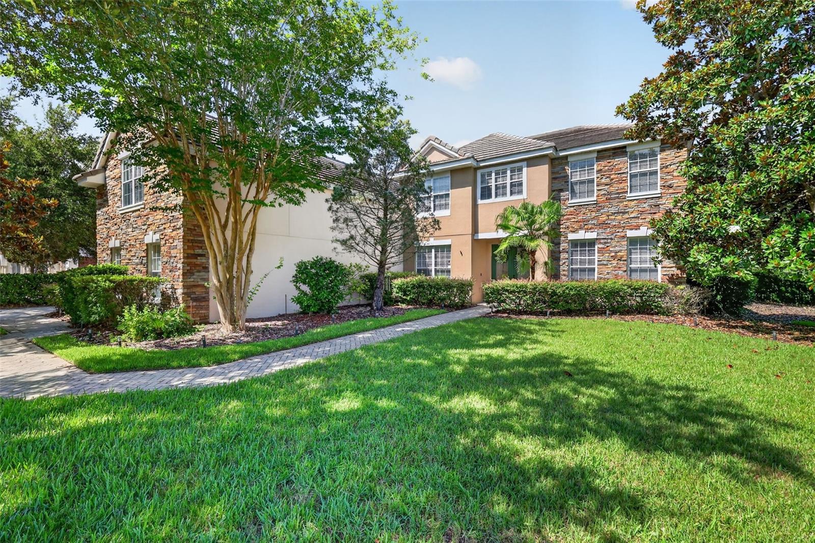 Elegant Loch Leven Living – Luxury, Space & Timeless Style
Welcome to this impeccably maintained residence in the highly desirable Loch Leven community, just minutes from the charming shops, restaurants, and waterfront of downtown Mount Dora.
Offering 5 bedrooms, 4 full bathrooms, and 4,425 square feet of thoughtfully designed living space, this exceptional home perfectly balances elegance with everyday comfort. Its versatile floor plan is ideal for multi-generational living, providing private retreats while maintaining inviting spaces for gathering and entertaining.
The main level features a spacious primary suite, offering convenience and privacy. Rich hardwood flooring and a cozy wood-burning fireplace create a warm, welcoming atmosphere throughout the main living areas. At the heart of the home, the expansive eat-in kitchen is designed to impress, featuring upgraded cabinetry, premium countertops, a breakfast bar, a prep island, and high-end appliances. The kitchen flows seamlessly into the family room, formal living room and dining room, making it ideal for both casual living and memorable entertaining. French doors open to the covered lanai, creating a seamless indoor-outdoor lifestyle.
Upstairs, you'll find a second private primary suite with its own ensuite bathroom and dressing room, three generously sized guest bedrooms, an additional full bath, and a versatile bonus room. An oversized sitting room offers the perfect space for a media room, playroom, or private retreat for family and guests. Completing the upper level is a spacious loft featuring a wet bar and pool table—an ideal setting for game nights, entertaining, or simply unwinding after a long day.
Step outside and experience Florida living at its finest. The covered lanai overlooks a beautifully landscaped corner lot spanning more than half an acre. Mature trees and lush landscaping provide exceptional privacy, creating a peaceful outdoor oasis perfect for relaxing or entertaining year-round.
Property Highlights
5 Bedrooms | 4 Full Bathrooms | Bonus Room
4,425 Square Feet of Living Space
Main-Level Primary Suite
Second Upstairs Primary Suite
Rich Hardwood Flooring
Wood-Burning Fireplace
Spacious Eat-In Kitchen with Upgraded Cabinetry, Premium Countertops, Prep Island & High-End Appliances
Open Floor Plan Designed for Entertaining
French Doors Leading to a Covered Lanai
Loft with Wet Bar & Pool Table
Oversized Sitting Room
Ideal Layout for Multi-Generational Living
Oversize 3 car garage
Over Half-Acre Corner Lot with Mature, Beautifully Landscaped Grounds
Located in the highly sought after Loch Leven Community
Just Minutes from Historic Downtown Mount Dora
This extraordinary home offers an exceptional blend of luxury, comfort, and flexibility in one of Mount Dora's most sought-after neighborhoods. From its spacious living areas and thoughtfully designed floor plan to its beautiful outdoor setting, every detail has been crafted for comfortable living and effortless entertaining.
Don't miss your opportunity to own this remarkable Loch Leven residence. Schedule your private showing today!