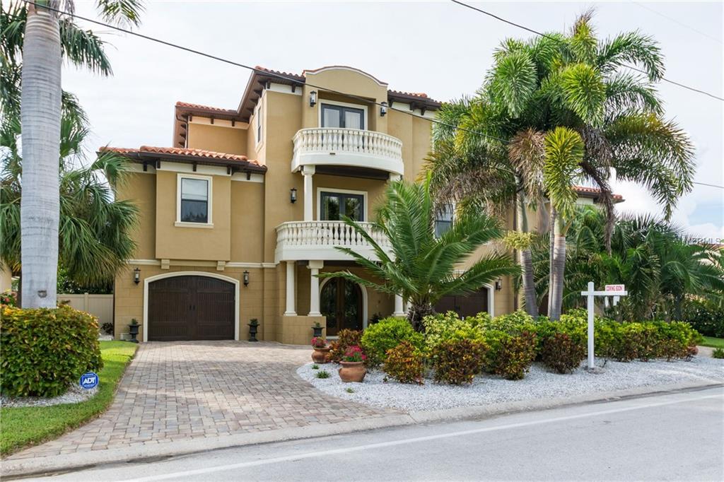 Spectacular and completely updated Mediterranean Home on Boca Ciega Bay. Property features a substantial resort-style outdoor living and entertaining area on two levels, including a kitchen, bar, dining area plus pool, Jacuzzi, and covered grotto. Boat enthusiasts will appreciate the two docks/lifts with easy access from Bay to Gulf. Inside, the luxury abounds in the Chef’s Kitchen featuring SubZero 72” refrigerator, Wolf Range, dual Fisher Paykel Dishwashers, and Butler’s Pantry with Wine Reserves.  No expense has been spared on interior finishes, which include Venetian plaster wall finishes and tray ceilings throughout, 8 foot Solid maple doors, polished Travertine and scraped hardwood floors as well as custom window treatments. All this plus private Elevator, 4 Balconies, Home Theatre Room, and a large Office/Study featuring custom cabinets and water view await you in this fabulous home.