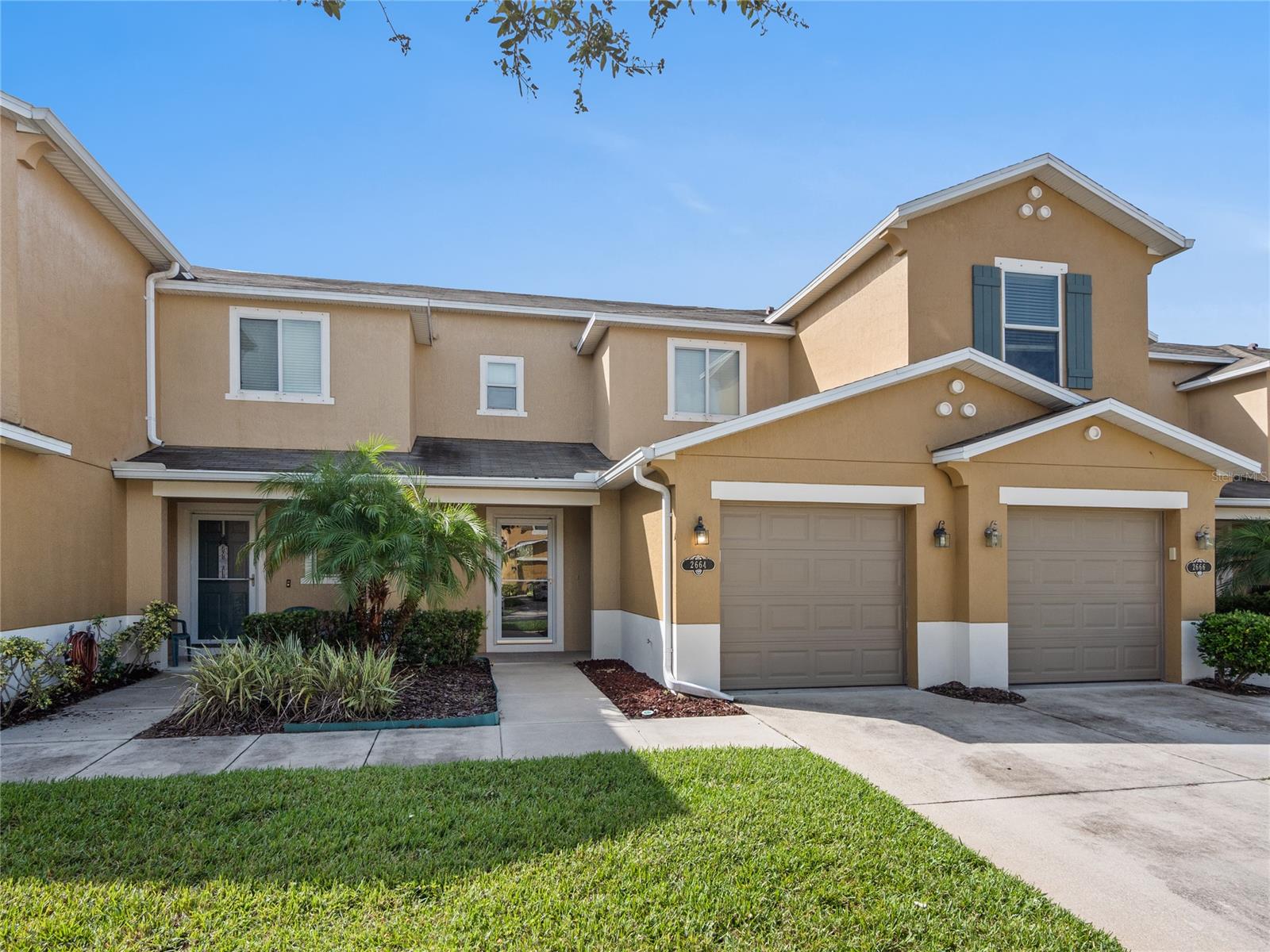 Looking for a lifestyle upgrade?! This is THE best priced 2 bedroom 2 and a half bath home, with the location of this home on an exceptionally quiet street in Landings at Sugar Mill...on a cul-de-sac with no constant traffic...and plenty of parking for guests. Live in style in this immaculate home with new flooring and custom paint on the first floor. Very private large, screened room off the back for quiet enjoyment or just unwinding after a long day. The upstairs primary bedroom has an updated on-suite bathroom. Conveniently located upstairs is the laundry area. Downstairs the open concept living space has lots of natural light streaming through the windows. Imagine mornings filled with the aroma of fresh brewed coffee enjoyed at the kitchen bar. Large pantry is super nice for extra appliances and food storage. Right off the kitchen is a over-sized one car garage. This home is located just minutes from I-95, I-4 and right off Pioneer Trail to head easily to Pt. Orange.  With this strategic location, it ensures your daily commute is nothing short of convenient. This is more than a townhome; it's an invitation to experience a very sought-after neighborhood with the short drive to the beach, premium boutique shopping and some of the very best restaurants New Smyrna has to offer. Don't miss out...this impeccable residence will not last long!!!! ;Water: City