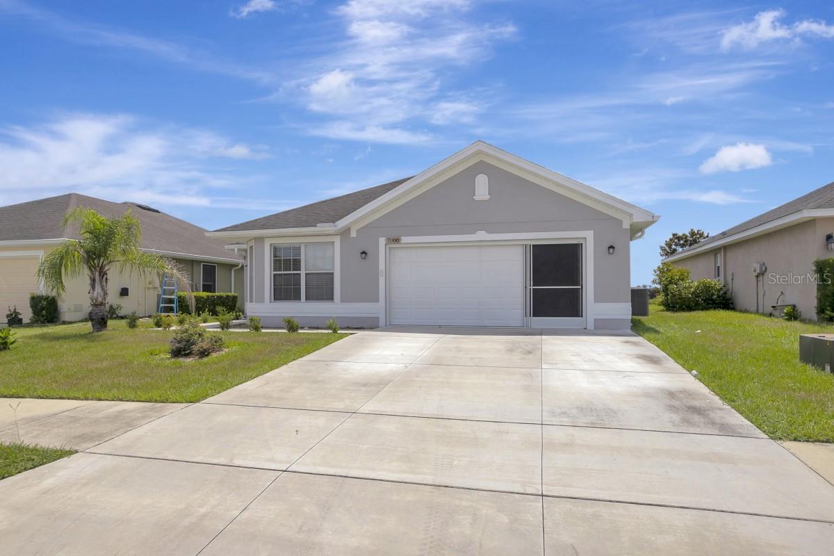 Welcome home to a beautifully updated 3-bedroom, 2-bathroom, 2-car garage gem nestled in Brooksville with quick and convenient access to the highway, making commutes a breeze
whether you're heading to Tampa, Spring Hill, or beyond. This move-in ready home checks every box. Step inside and be immediately impressed by the rich, dark luxury vinyl plank flooring that flows
seamlessly throughout the entire home -- no carpet anywhere! Fresh neutral paint on every wall gives the interior a bright, clean, modern feel that's ready for your personal touch. The spacious living room
welcomes you with soaring vaulted ceilings and a ceiling fan, bathed in natural light from the back door that leads directly to your screened lanai -- the perfect Florida outdoor space to enjoy morning coffee or
evening gatherings, rain or shine. The kitchen is a true standout, featuring rich cherry wood cabinetry with elegant raised paneling, stunning granite countertops, recessed lighting, and a full suite of stainless
steel appliances including a French door refrigerator, smooth-top range, built-in microwave, and a deep sink with granite surround. An adjacent breakfast nook/dining area with a ceiling fan and large window
keeps the space light and airy. The primary suite offers generous proportions, vaulted ceilings, a ceiling fan, and a private en-suite bathroom. Two additional bedrooms are well-sized with ceiling fans and LVP
flooring -- ideal for family, guests, or a home office setup. The updated guest bathroom features a beautifully updated walk-in glass shower with sliding barn-style doors, a modern vanity with granite counters,
and brushed nickel fixtures throughout. Outside, the home sits on a well-maintained lot with a manicured lawn, a screened Florida room with its own entrance. With fresh paint, updated bathrooms, new
flooring, stainless appliances, and a screened lanai -- this home is truly turn-key. Priced to sell and ready for its next chapter. Schedule your private showing today before it's gone!