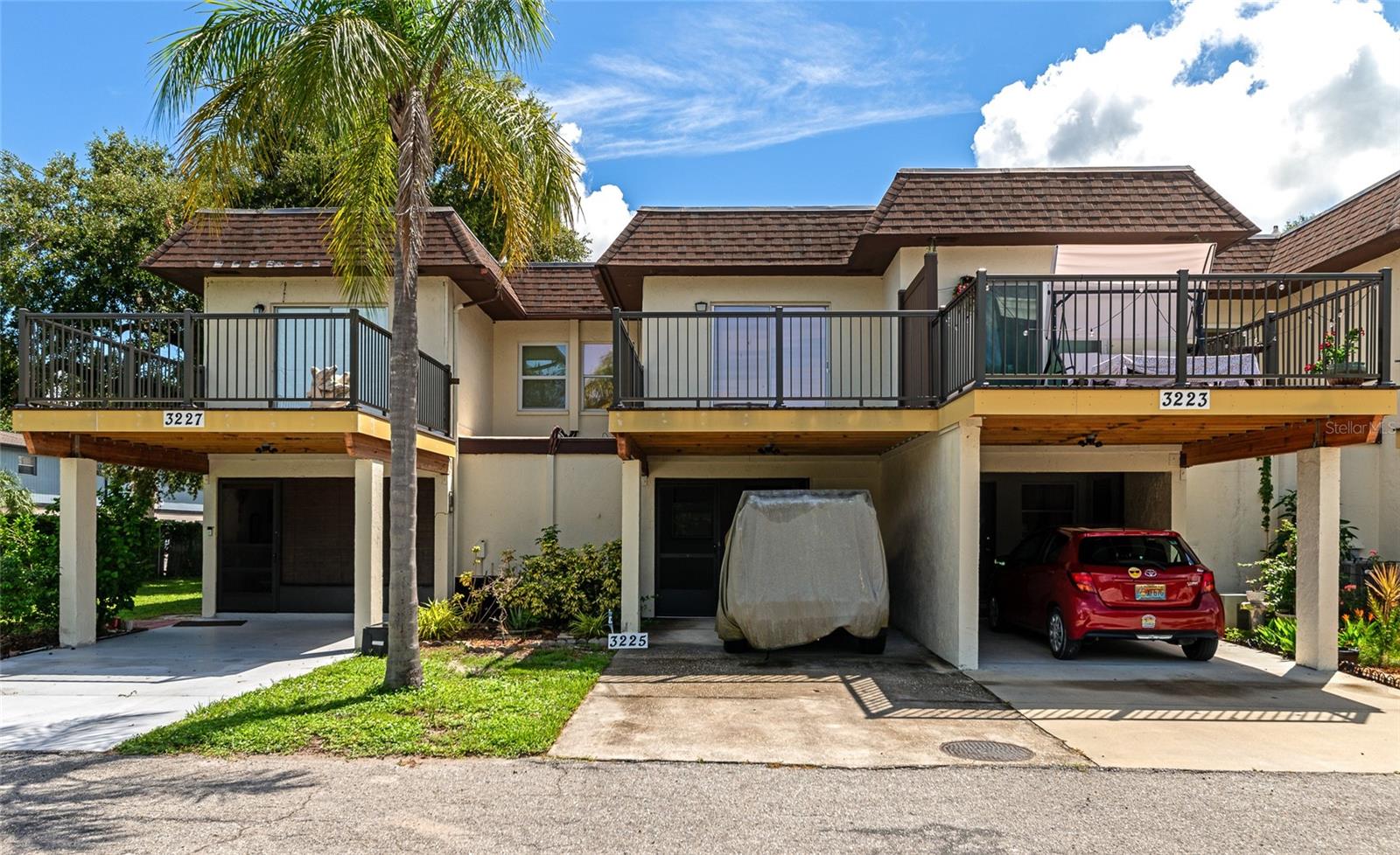 Experience the epitome of maintenance-free living in the heart of Florida at Ramblewood Acres, a fantastic, gated community offering an array of luxurious amenities. Nestled in a vibrant, friendly neighborhood, this community features beautifully designed townhouses and villas surrounded by lush landscaping and mature trees. This meticulously renovated home boasts modern elegance throughout. As you step inside the charming kitchen, it invites you in to prepare your next meal. Featuring gleaming granite countertops, neutral cabinetry, and high-end stainless steel appliances it is truly a chef's delight. The attention to detail extends to the freshly painted interiors in the open-concept living and dining area where you can gather during the holidays. The spacious layout includes three full bedrooms upstairs, providing plenty of space for family and sleepover guests. The primary bedroom serves as a serene retreat after a long day, featuring direct access to a private wood deck through sliding glass doors—an ideal spot to unwind and watch the sunset. This tranquil space also includes an attached en-suite bathroom and double closets, providing ample storage for all your needs. Additional conveniences include an in-unit laundry area, a rare outside storage room that is unique to this complex, and parking is a breeze with two dedicated spaces! Residents of Ramblewood Acres enjoy access to three sparkling swimming pools, perfect for cooling off on warm Florida days. Stay active with the on-site tennis courts and playground, or gather with friends and neighbors at the expansive clubhouse, which includes a state-of-the-art fitness center, a billiards room, a fully equipped kitchen and dining area, a well-stocked library, and a large gathering room ideal for social events. Conveniently located in the heart of Sarasota, this community is just minutes away from world-renowned beaches, the Oriole Spring Training ballpark, and popular shopping and dining activities in the vibrant downtown area. Do not miss out on this opportunity, call today to schedule a private tour before it's gone!