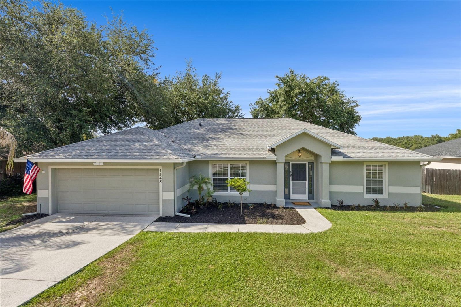 3-bedroom, 2-bath single-family waterfront home located in the Oak Valley community of Minneola. Situated on a 0.43-acre lot with approximately 95 feet of frontage on Golden Pond, this property includes 1,778 square feet of living space and water views from multiple rooms.

The home features an open floor plan with vaulted ceilings, a split-bedroom layout, and a dedicated office/den. The kitchen includes solid wood cabinetry, stone countertops, an eat-in dining area, and updated appliances including a refrigerator, range, microwave, dishwasher, and ice maker. Sliding glass doors provide access to a screened rear porch overlooking the pond.

The primary bedroom includes an en-suite bathroom and views of the backyard and water. Two additional bedrooms and a second full bathroom are located on the opposite side of the home.

Exterior features include a fully fenced backyard with double-gate access, irrigation system, landscape lighting, rain gutters, sidewalks, and an attached two-car garage with driveway parking. The oversized lot provides additional outdoor space for recreation, gardening, or storage of permitted items.

Built in 2005 with block and stucco construction, the home includes central air conditioning, public utilities, underground services, and high-speed internet availability. Roof replaced in 2022.

Property Features:
* 3 Bedrooms
* 2 Bathrooms
* 1,778 Square Feet Living Area
* 0.43-Acre Lot
* Approximately 95 Feet of Frontage on Golden Pond
* Office/Den
* Screened Rear Porch
* Open Floor Plan
* Vaulted Ceilings
* Stone Countertops
* Solid Wood Cabinets
* Updated Kitchen Appliances
* Split-Bedroom Layout
* Attached Two-Car Garage
* Fully Fenced Backyard with Double-Gate Access
* Irrigation System
* Landscape Lighting
* Block and Stucco Construction
* Roof Replaced in 2022
* Central Air Conditioning
* Public Utilities
* High-Speed Internet Available