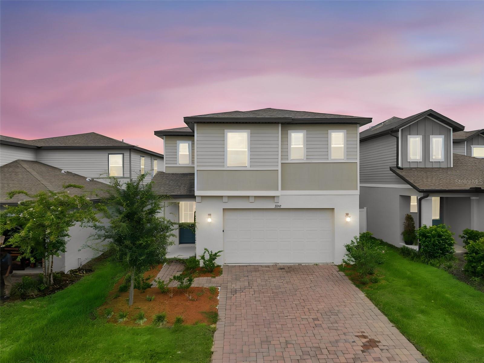 Welcome to 2292 Mystic Maze Lane, where modern elegance, everyday comfort, and energy-efficient living come together in the highly sought-after Villages at Minneola Hills. Built in 2022 by Meritage Homes, this beautifully designed 3 Bedrooms, 2.5 Bathrooms residence offers 2,304 square feet of thoughtfully planned living space, combining luxury finishes with industry leading energy efficiency in one of Central Florida's fastest-growing communities.

From the moment you arrive, you'll be impressed by the paved driveway, attractive exterior, and elegant front entry with a decorative glass insert. Inside, the bright open concept floor plan seamlessly connects the spacious family room, dining area, and chef inspired kitchen, making it perfect for entertaining and everyday living. The kitchen features 42-inch cabinetry, granite countertops, stainless steel appliances, abundant storage, and generous prep space. Tile flooring throughout the first floor and a convenient half bath add both style and functionality.

Upstairs, the spacious primary suite offers a private retreat complete with an en-suite bath and walk-in closet. Two additional bedrooms provide flexibility for family, guests, a home office, or fitness space. Enjoy Florida living from the covered front porch or relax on the covered rear patio, while the spacious two-car garage provides ample storage.

Built with Meritage Homes' renowned energy efficient construction, this home includes spray foam insulation, UV-blocking Low-E windows, climate-sealed construction, advanced air filtration and humidifier systems, and water-saving fixtures designed to enhance comfort while helping reduce utility costs.

Living in the Villages at Minneola Hills is about more than owning a beautiful home it's embracing an exceptional lifestyle. Residents enjoy resort-style amenities including a clubhouse, fitness center, swimming pool, playgrounds, dog parks, picnic areas, scenic walking trails, and preserved green spaces. The expanding Hills of Minneola community will soon feature Hills City Center, offering shopping, dining, entertainment, the popular Crooked Can Brewing Company, a new AdventHealth campus, and additional exciting future development.

Ideally situated in the scenic rolling hills of Minneola, just 30 miles from Downtown Orlando, this home offers quick access to the Florida Turnpike, making commuting effortless while placing Walt Disney World, Universal Orlando Resort, Lake Minneola, Waterfront Park, Costco, top-rated schools, shopping, dining, and major healthcare facilities just minutes away.

Whether you're searching for your forever home or looking for the perfect combination of luxury, energy efficiency, convenience, and community, 2292 Mystic Maze Lane offers an exceptional opportunity to experience one of Central Florida's premier master-planned neighborhoods.