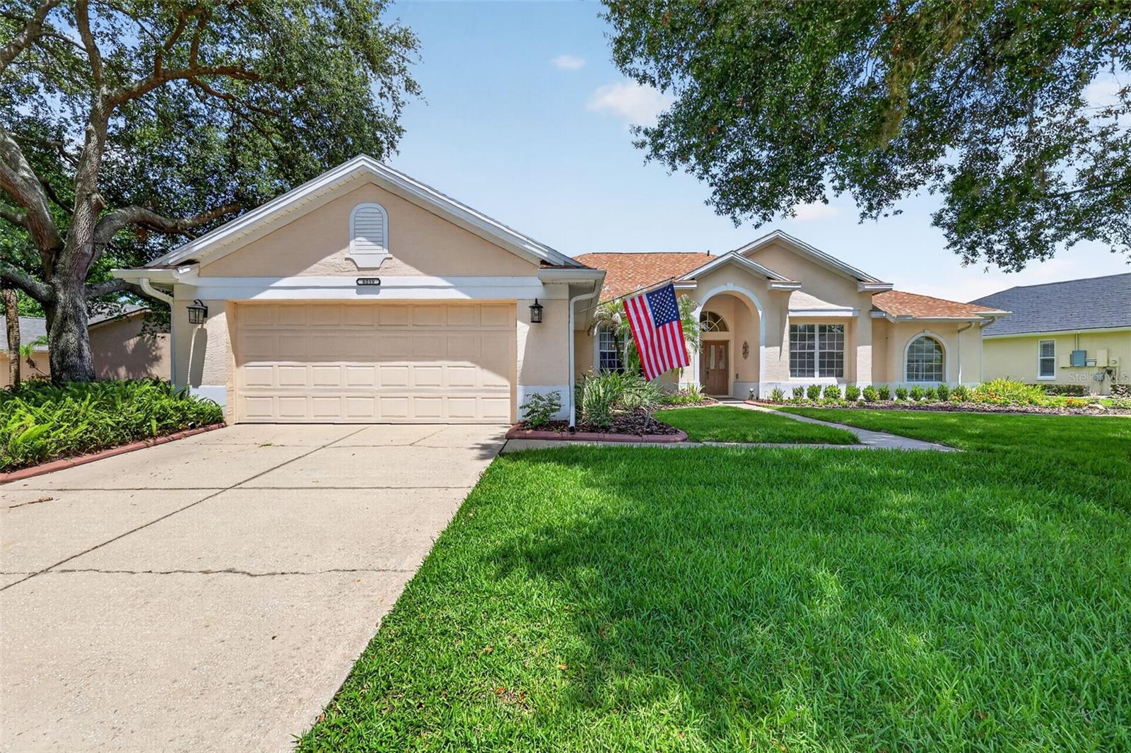 Welcome to this beautifully maintained 3-bedroom, 3-bath residence tucked inside the sought-after Country Club of Mount Dora, where thoughtful updates, spacious living, and an unbeatable location come together. With a NEW ROOF (2022) and NEW HVAC (2023), many of the home's major systems have already been taken care of, allowing you to move in with confidence.
Step inside to soaring ceilings, abundant natural light, and a flowing floor plan designed for both everyday comfort and effortless entertaining. The formal living and dining rooms create an inviting first impression, the home features a spacious kitchen complete with wood cabinetry, solid surface countertops, stainless steel appliances, a center prep island, and a sunny breakfast nook that overlooks the family room. Whether you're hosting family gatherings or enjoying a quiet morning coffee, this open-concept space is designed to bring everyone together.
The generously sized primary suite offers a peaceful retreat with private access to the screened lanai, and a spacious en-suite bath featuring dual vanities, a dedicated makeup station, a soaking garden tub, and a separate tiled shower. A dedicated office sits just outside the primary suite, making it the perfect work-from-home space, hobby room, or optional fourth bedroom. On the opposite side of the home, two additional bedrooms share a convenient Jack-and-Jill bath, providing privacy and functionality for family or guests.
This home has been thoughtfully enhanced with numerous upgrades, including a rainsoft whole-house filtration and water softener system, updated kitchen appliances, newer carpet, upgraded electrical panel with whole-house generator readiness, Wi-Fi programmable irrigation controls, and modern ceiling fans with remote-controlled dimmable lighting.
Step outside to your oversized screened lanai, an ideal extension of the living space where you can relax, entertain, or simply enjoy the peaceful backyard surrounded by mature landscaping, including avocado and lemon trees.
Located just minutes from charming downtown Mount Dora, you'll enjoy easy access to award-winning restaurants, unique boutiques, waterfront parks, festivals, and year-round community events. Residents of the Country Club of Mount Dora also enjoy access to a community park and playground, with optional country club membership offering championship golf, tennis, pickleball, swimming, dining, and an active social calendar.
Offering nearly 2,800 square feet of thoughtfully designed living space, quality updates throughout, and an exceptional location, this home is ready to welcome its next owners. Experience the lifestyle that makes Mount Dora one of Central Florida's most desirable places to call home.