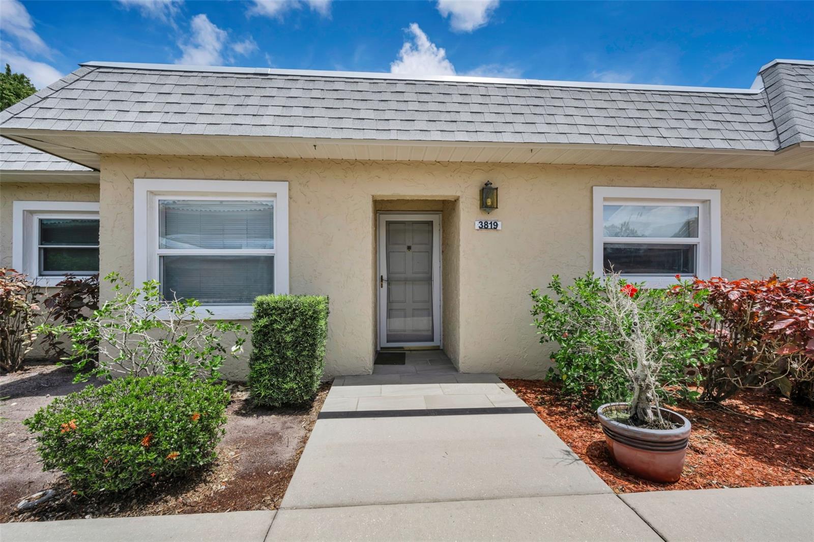 Call to schedule your private showing of this charming villa in the desirable Seven Springs community. Enjoy an active Florida lifestyle with access to fitness facilities, pickleball, tennis, golf,  and a vibrant clubhouse, all available for a small annual fee. This gated community offers 24/7 guarded entry for added peace of mind. Inside, you'll find a bright and inviting kitchen featuring stainless steel appliances and easy-care vinyl flooring throughout the villa. The spacious split-bedroom floor plan provides privacy, with each bedroom separated by its own bathroom. Water, sewer, trash, and cable are all included, making this home both comfortable and convenient. Don't miss this opportunity to enjoy resort-style living in a wonderful community. Renters Insurance a must.
