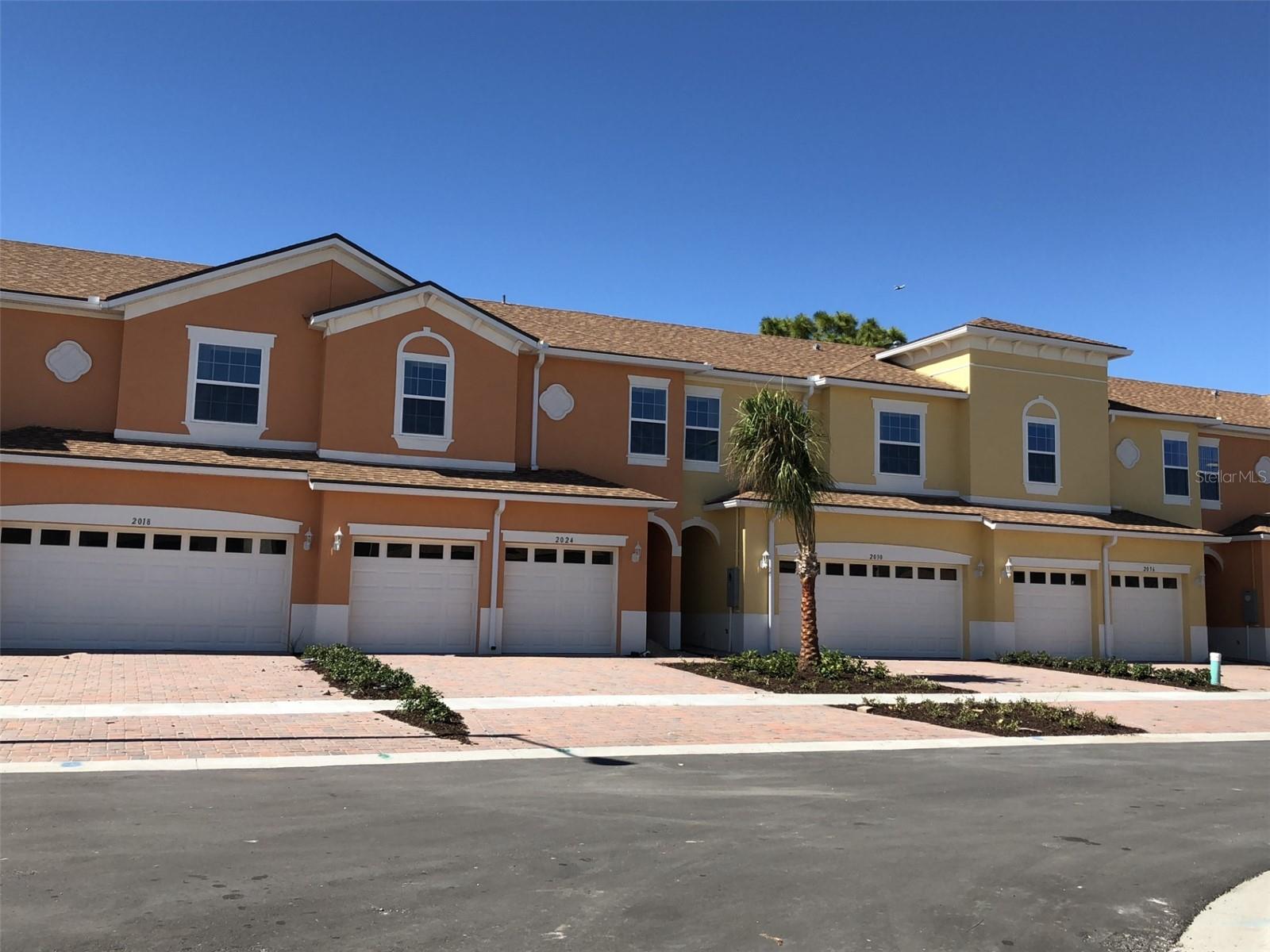Welcome Royal Vista a spacious and modern townhome ideally located in the heart of East Orlando, just minutes from the University of Central Florida (UCF). Recently built, this impressive residence offers 5 bedrooms, 3.5 bathrooms, and a flexible floor plan designed to accommodate families, professionals, or roommates seeking both comfort and convenience. The home features an open concept living area, a well appointed kitchen with granite countertops, stainless steel appliances, and ample cabinet space, along with hardwood and tile flooring throughout the main living areas. Multiple bedrooms and bathrooms provide privacy and versatility, while the spacious primary suite offers a relaxing retreat with generous closet space and a private bath. A two car garage and additional parking add to the home’s functionality. Innovation hubs throughout the University corridor. Downtown Orlando, Orlando International Airport, and the area’s world famous attractions.