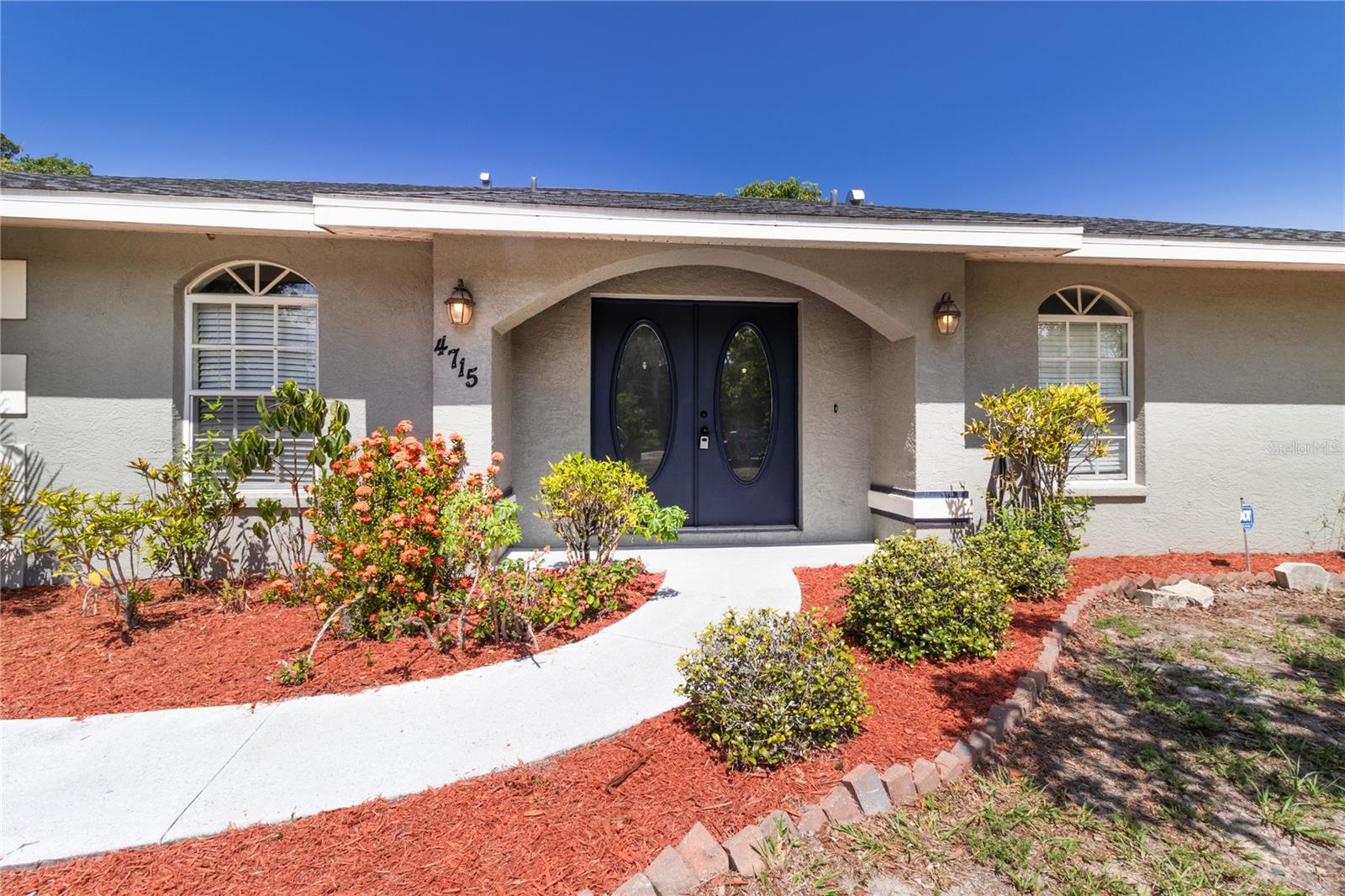 Virtually Staged. 4 Bedroom, 2 Bathroom Home with Bonus Room and a Private Office with it's own Entrance is sure to please. Built in 2002 this home has a number of upgrades including, New AC 2021, New Roof 2019, New Addition put on in 2021,  Large Screened in Lanai Overlooking your Fully Fenced Backyard with your very own Mango Trees, Storage Shed, and with over 1/4 acre of land there is plenty of room for a pool. And the Best Part is No HOA fees, No CDD Fees, and you are not in a Flood Zone! Come and take a look at this amazing property today!