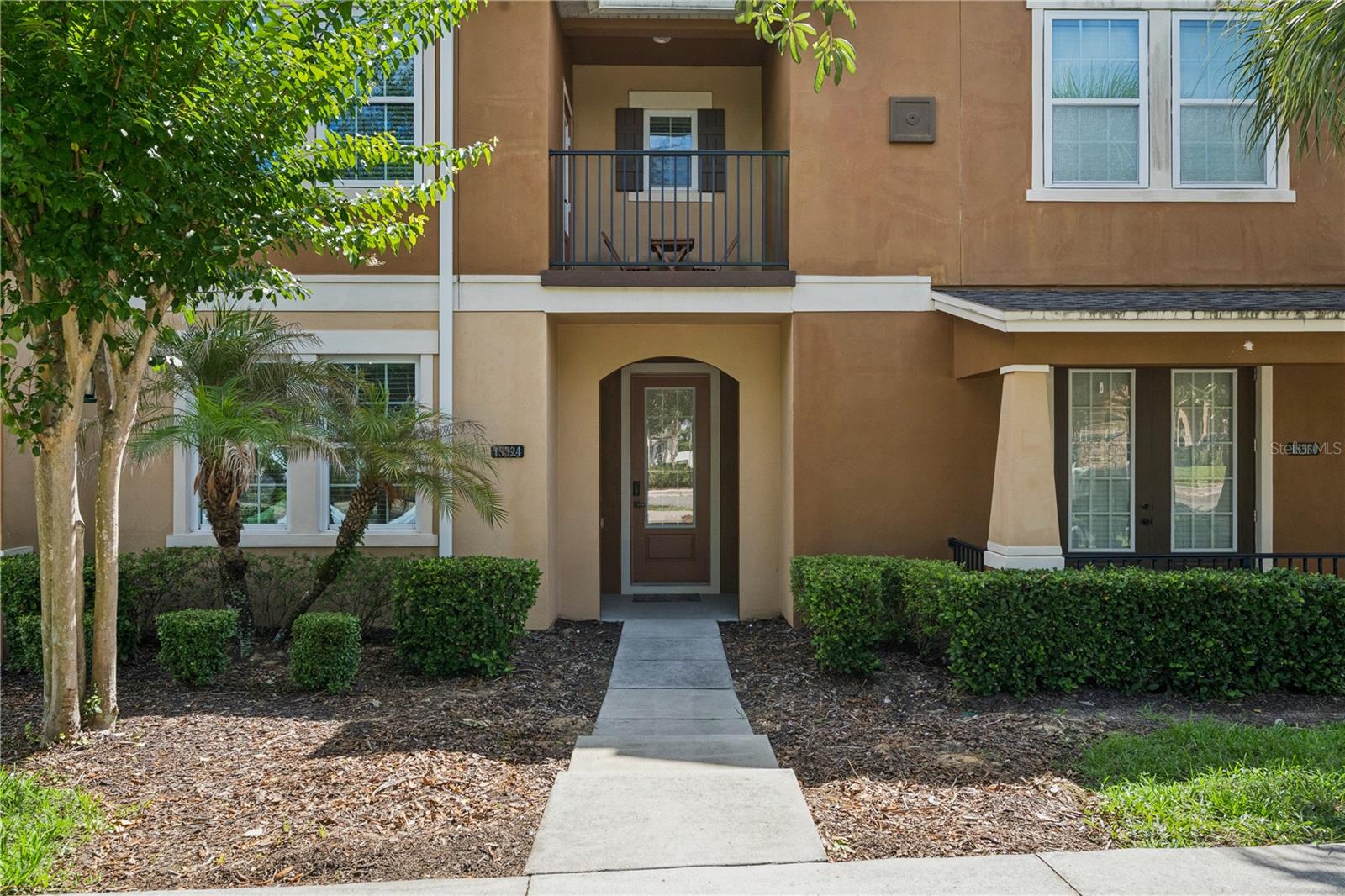 Look no further!!!!  This beautifully upgraded 4-bedroom, 3-bathroom townhome offers the perfect blend of luxury, style, and convenience in the highly sought-after Hamlin Reserve community. Thoughtfully enhanced with designer finishes throughout, this spacious residence is truly one of a kind and ready for its next owner.
From the moment you enter, you'll appreciate the custom ceramic tile flooring, expanded luxury recessed lighting, and open-concept design that creates a bright and inviting atmosphere. The first floor features a generously sized bedroom and full bath, providing the perfect space for guests, a home office, fitness room, or multigenerational living.
At the heart of the home is the spectacular, completely remodeled and expanded chef’s kitchen, renovated in 2024. Designed to impress, it features a massive custom 5' x 8' quartz island, abundant cabinetry, farmhouse sink, wine refrigerator, custom wood range hood, ceiling-height designer backsplash, a large walk-in pantry, and a new range installed in 2024. The kitchen seamlessly flows into the dining and family rooms, creating the ideal setting for entertaining family and friends.
Step outside to your private, fully paved courtyard, complete with a dedicated dog run and plenty of space for outdoor dining and relaxation. The courtyard leads directly to the spacious two-car garage, offering both convenience and functionality.
A beautifully remodeled open staircase leads to the second floor, where you'll find a desirable split-bedroom layout designed for privacy and comfort. The spacious primary retreat features a private balcony, creating the perfect place to enjoy your morning coffee or unwind at the end of the day. The luxurious en-suite bathroom offers dual vanities, a glass-enclosed shower, and a large walk-in closet. Two additional bedrooms, a full bathroom, and a conveniently located laundry room complete the upper level.
Residents enjoy a maintenance-free lifestyle with HOA-covered exterior maintenance, landscaping, and roof care, along with access to outstanding community amenities including a resort-style pool, clubhouse, playground, dog park, and beautifully maintained green spaces.
Location is everything, and this home delivers. Situated just a short walk or quick five-minute drive from Hamlin Town Center, you'll enjoy easy access to exceptional shopping, dining, entertainment, and everyday conveniences, including Cinépolis Luxury Cinemas. Nearby attractions include Orlando Health Horizon West Hospital, Orange County National Golf Center, Horizon West Regional Park, and major highways for effortless commuting. Best of all, all Walt Disney World parks are just 15 minutes away.
This exceptional townhome offers luxury upgrades, an unbeatable location, and a lifestyle you'll love. Schedule your private showing today—you will not be disappointed!