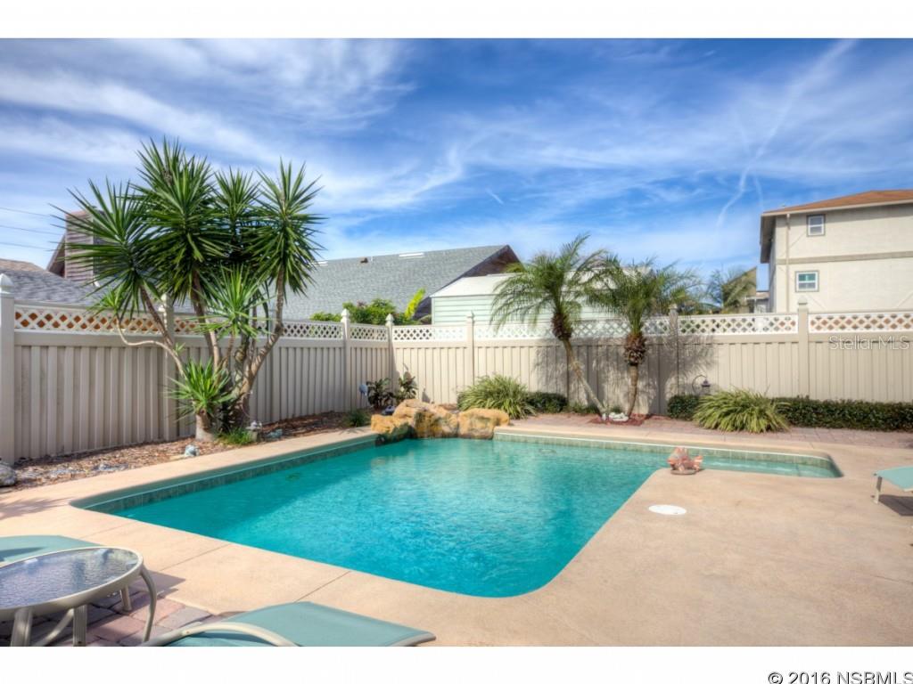 A beautiful paradise!Amazing remodeled home sits across the street from the ocean.  Your day can also include a cool off in the pool amidst the landscaped backyard.