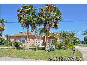 Watch the yachts go by on the Intracoastal from this custom-built brick home in great location on dead-end street. Formal livingroom or den leads to 2nd suite & is ideally set-up for in-law quarters. Office can be 4th bdrm. High ceilings. Spacious kitchen with large breakfast nook. Separate dining room (fixture does not convey). Double paned windows & sliders. Central vacuum. Storm shutters. HVAC replaced appx 2013. Oversized 2 car garage with workshop. Large screened porch overlooks sparkling pool & river. See to appreciate the value this property. ;Water: City