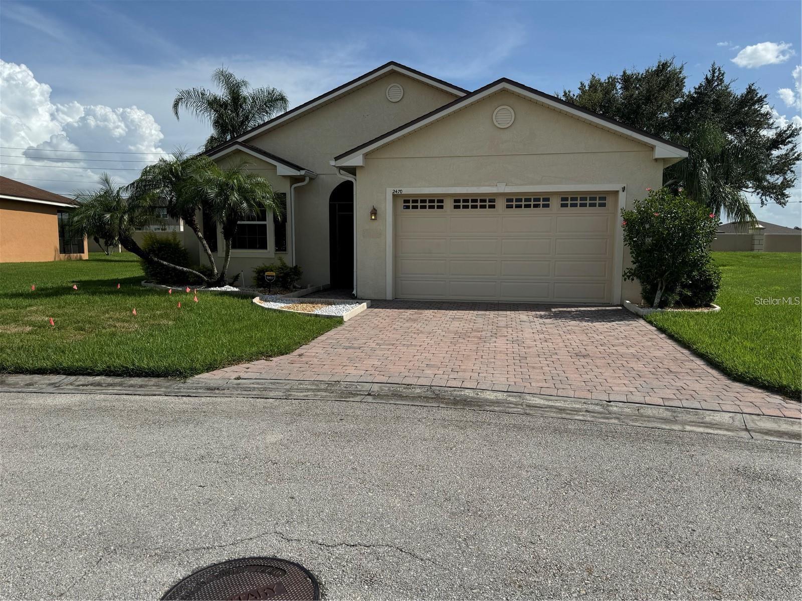 Welcome to Vienna Square, one of Winter Haven's premier gated 55+ active adult communities, where comfort, convenience, and resort-style living come together. This beautifully maintained and highly desirable Beethoven model offers 3 spacious bedrooms, 2 full bathrooms, and an open, thoughtfully designed floor plan with generous living spaces perfect for entertaining family and friends or simply relaxing at home.

The well-appointed kitchen features solid surface countertops, rich wood cabinetry, stainless steel appliances, abundant cabinet storage, and a convenient pantry, making meal preparation both functional and enjoyable. The spacious primary suite is a true retreat with dual vanities, a relaxing garden tub, and a separate walk-in shower. Throughout the home, you'll appreciate the quality upgrades, exceptional maintenance, and move-in ready condition.

Step outside to your private screened lanai, the perfect place to enjoy your morning coffee, unwind in the evening, or entertain guests while taking advantage of Florida's beautiful weather.

Low HOA fees provide outstanding value and include lawn maintenance, cable television, and gated security, allowing you to enjoy a carefree, low-maintenance lifestyle.

Vienna Square offers an impressive selection of resort-style amenities, including a magnificent clubhouse, heated swimming pool and spa, state-of-the-art fitness center, tennis courts, billiards room, movie theater, restaurant, and a full calendar of social activities. The community is uniquely situated within a continuing care campus, providing the peace of mind of future assisted living services nearby while allowing residents to enjoy an active, independent lifestyle today.

Don't miss this opportunity to own an exceptional home in one of Winter Haven's most sought-after active adult communities. Schedule your private showing today and discover everything Vienna Square has to offer!