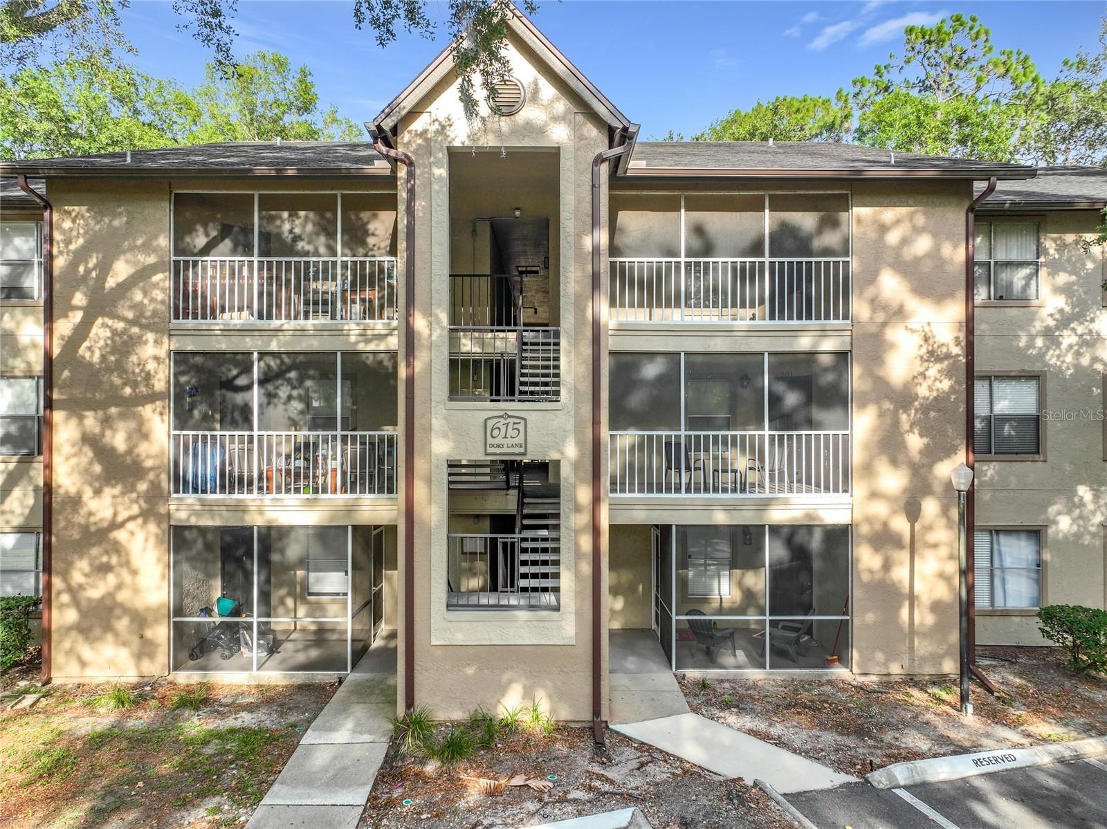 Welcome to this spacious and well-maintained third-floor condominium nestled among mature oak trees in the heart of Altamonte Springs. Offering a peaceful setting with serene wooded views, this move-in-ready residence combines comfort, convenience, and an unbeatable location. Step inside to discover a bright and open floor plan featuring durable tile flooring throughout the main living areas, abundant natural light, and a generously sized living and dining space perfect for everyday living or entertaining. The kitchen offers ample cabinet and countertop space, updated finishes, and a functional breakfast bar that overlooks the main living area. The spacious primary suite provides a relaxing retreat with a walk-in closet and private en-suite bath, while the secondary bedroom offers flexibility for guests, a home office, or additional living space. A full-size washer and dryer are conveniently located inside the unit, adding everyday convenience and value. Enjoy your morning coffee or unwind in the evening from the screened-in balcony, surrounded by lush landscaping and tranquil community views. Residents enjoy access to an impressive selection of community amenities, including multiple swimming pools, a fitness center, sand volleyball court, playground, dog park, scenic ponds with fountains, and walking paths, all set within a beautifully wooded environment. The location places you just minutes from Cranes Roost Park, Altamonte Mall, Uptown Altamonte, Wekiwa Springs State Park, and numerous shopping, dining, and entertainment destinations. Commuters will appreciate easy access to I-4, SR-436, and SR-434, providing quick connections to Downtown Orlando, Winter Park, Maitland, and the area's major employment centers. Whether you're a first-time homebuyer, downsizing, or searching for an excellent investment opportunity, this inviting Altamonte Springs condo offers low-maintenance living in one of Central Florida's most convenient and desirable locations.
