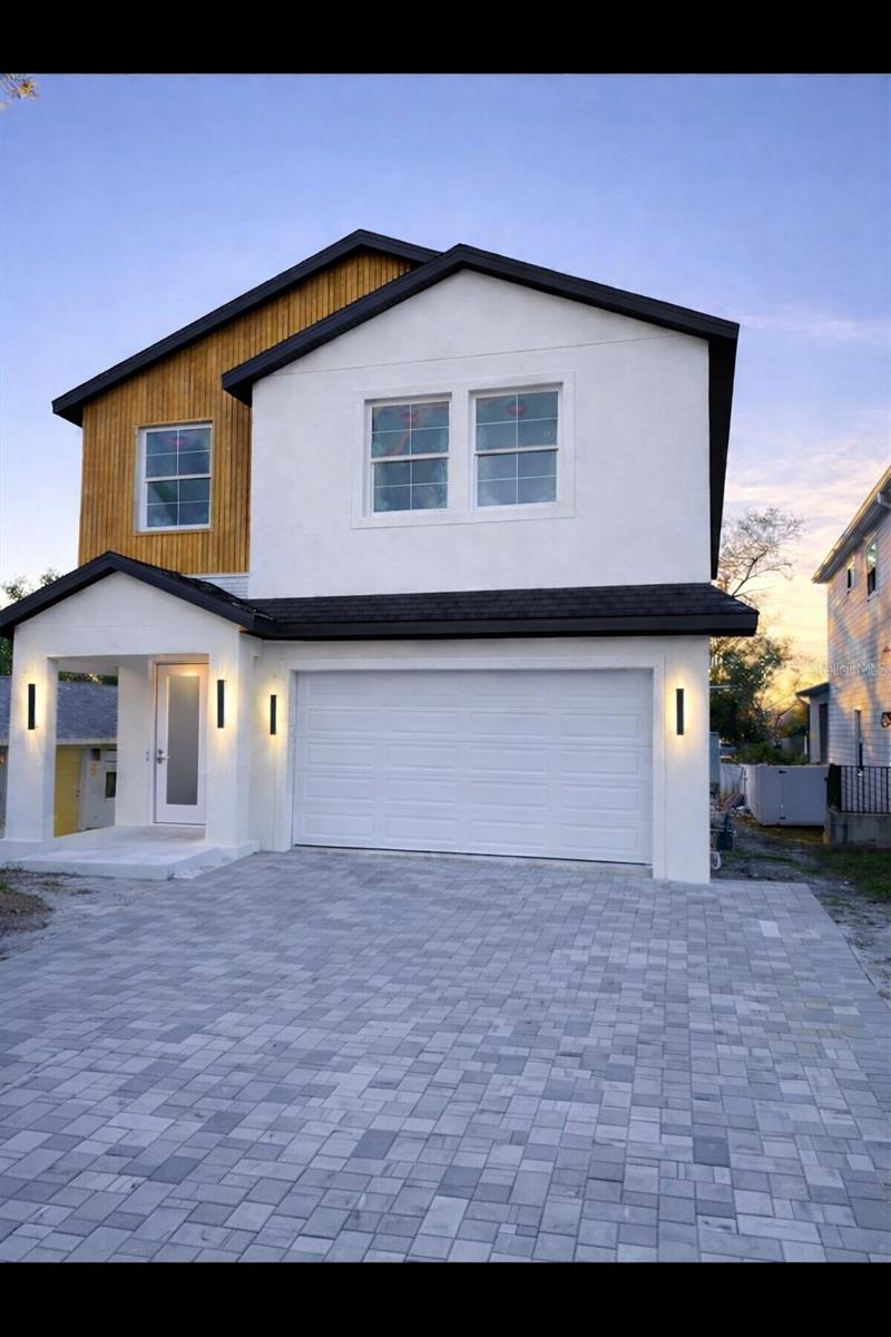 One or more photo(s) has been virtually staged. THE BUILD IS DONE!!  IF YOU HURRY-AN OPPORTUNITY BECKONS- BRAND NEW ALL BLOCK DUNEDIN CONSTRUCTION HOME W/5 BEDROOMS, 4 BATHS & 3,000 SQ.FT. AT THE FOUR CORNERS OF DUNEDIN’S SHOPPES, RESTAURANTS, GASTROPUBS AND LESS THAN 3/4 OF 1 MILE TO IT’S MARINA, WATERFRONT PARK, AND WATER ACCESS. Look at the photos of the home adjacent- This one sold in ‘24-I’ve attached the pics ... DUNEDIN, AND THIS REMARKABLE BUILD AWAIT YOUR FAMILY’S LEGACY