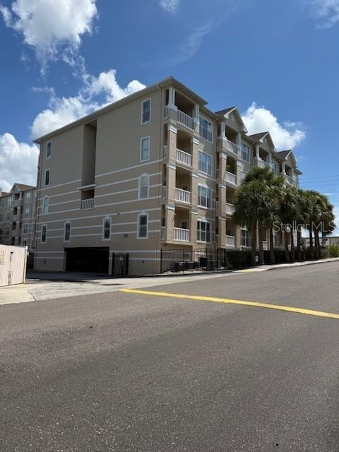 *AVAIL OCT2026*CLOSE TO CLEARWATER BEACH#1 RATED BEACH-Just 3 miles! Super location*UNFURNISHED*NICELY UPDATED 1bedroom 1 bath in a GATED COMMUNITY with a POOL, FITNESS CENTER and 1 under Bldg parking space#76(not all have this) RENT INCLUDES--WATER,TRASH,CABLE,INTERNET--Plus a Balcony to escape to! This unit has wonderful upgrades. As you enter the kitchen cabinets are contemporary style nearly to ceiling with pull out drawers. GORGEGOUS EXTENDED Granite counter-top with FARM SINK and extra cabinets below. NEW DISHWASHER, plus Full size washer/dryer included in its own closet. CROWN MOLDING, engineered WOOD flooring, and wired for surround sound encompass the spacious living room. Extra cabinet in bathroom for your things PLUS the Walk-In master closet has been built out (california closet) EXTRA LARGE STORAGE space #211 included. WALKABLE to restaurants and grocery shopping. This complex has it all- 2 elevators, a fitness center, business center, community Pool and GATED. Unit comes with Under bldg parking and a storage unit.SO CLOSE TO THE BEACH! 5min to Clearwater Beach. Just 10-15min to Delightful Dunedin, Caladesi/Honeymoon Island. 20 min to Tampa International Airport. 20 minutes to St Pete-LOCATION-LOCATION