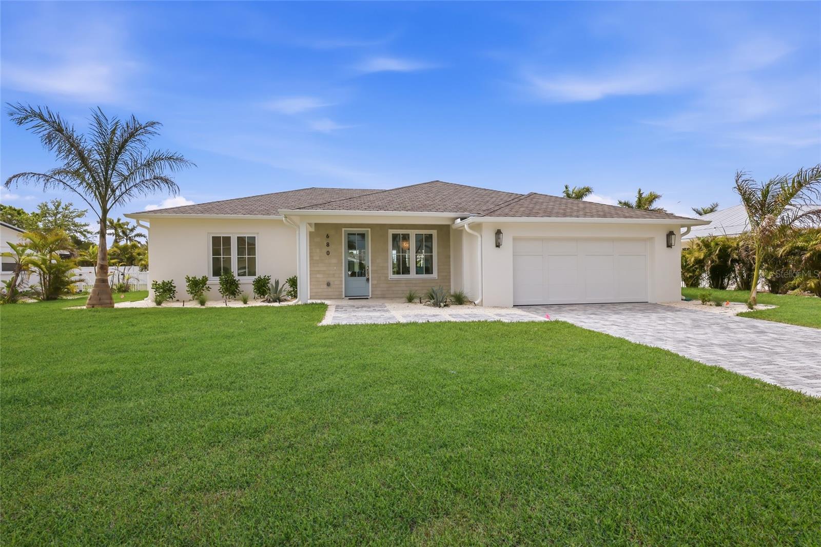 Stunning Fully Remodeled Canal-Front Oasis in Prestigious Key Royale! 
Welcome to your slice of paradise, a beautifully reimagined 3-bedroom, 3-bathroom waterfront retreat on exclusive Anna Maria Island. This  coastal gem has undergone a complete remodel, blending contemporary luxury with relaxed island living in the sought-after Key Royale community, home to the island’s only private golf course and just moments from pristine Gulf beaches.
Step inside to discover an open, light-filled floor plan with high-end finishes throughout: sleek new kitchens with premium appliances, elegant quartz countertops, and custom cabinetry; spa-like bathrooms featuring designer fixtures and walk-in showers; and spacious bedrooms offering serene comfort. Every detail has been thoughtfully updated for effortless Florida living.
Outside, your private backyard paradise awaits – a sparkling heated pool and spa with a chiller for year-round enjoyment, perfect for cooling off on warm summer days or soaking under the stars. The expansive lanai provides ample space for outdoor dining, lounging, and entertaining while overlooking the serene canal.
Boaters will love the direct canal access with a 12,000 lb boat lift and private dock with electric– ideal for quick runs to the Gulf, fishing, or exploring the Intracoastal waterways. No bridges to the bay means easy outings!
Located in the heart of Holmes Beach on Anna Maria Island, you’re just minutes from world-class white-sand beaches, charming restaurants, boutique shops, and the laid-back vibe that makes this area a top vacation and year-round destination.  Schedule your private showing today!