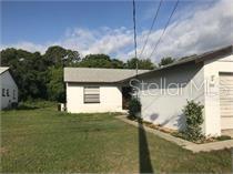 Great location across from Elementary School and next to Day Care Center.  This spacious 2BR-2BA half of duplex has one car garage.