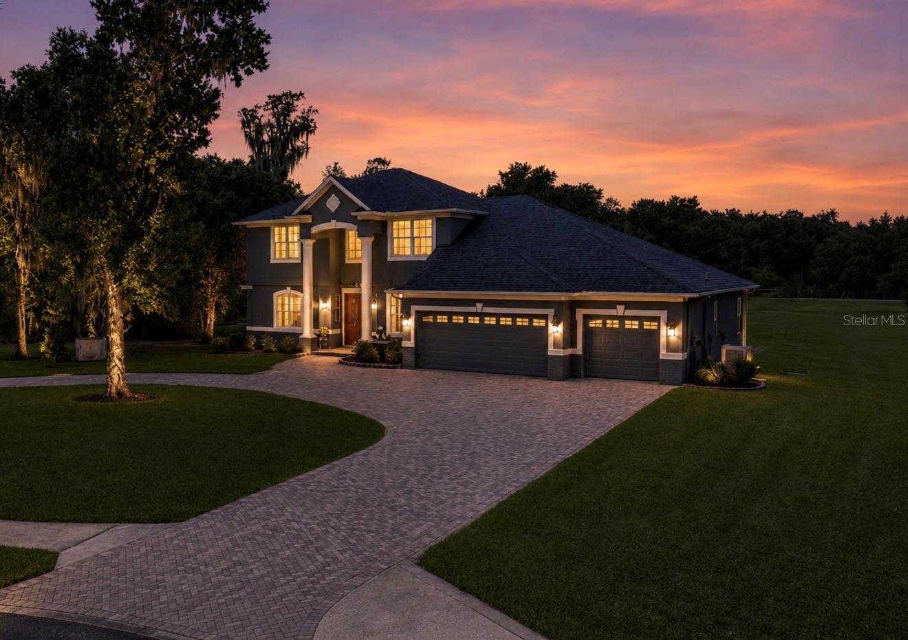 Welcome to Lithia Estates, where peaceful country living meets neighborhood convenience. Situated on 2.04 acres, this exceptional property offers the perfect balance of space, privacy, and accessibility while remaining just minutes from Fishhawk shopping, dining, and everyday essentials. Bring your toys—boat and RV parking are permitted with restrictions, and up to two horses are allowed.
This spacious 4-bedroom, 4-bathroom home offers a thoughtful layout with a first-floor primary suite featuring an updated bathroom. The kitchen and family room create a warm and inviting gathering space, while the formal living and dining rooms provide additional flexibility for entertaining or everyday living. The family room features a built-in entertainment wall, surround sound, and the entire home is pre-wired for speakers and internet for added convenience and connectivity.
Upstairs, you’ll find three additional bedrooms with a thoughtful layout, including convenient bathroom access and flexible spaces to fit your lifestyle. One bedroom features a pocket door connecting to a shared bathroom, while another full bathroom offers a spacious walk-in shower, providing comfort and privacy for everyone. The oversized fourth bedroom features French doors leading to a private balcony overlooking the expansive backyard and can easily be used as a bonus room, media room, or private retreat.
Step outside to your own private backyard oasis featuring a sparkling pool with a paver deck, inground lighting, outdoor shower, and a full pool bathroom accessible through the lanai. The covered outdoor entertaining area is perfect for grilling and gatherings and is already pre-wired and plumbed for the outdoor kitchen of your dreams. Enjoy beautiful sunset views, exceptional privacy, and peaceful surroundings with mature trees along one side, hedging on the other, and no backyard neighbors—just serene countryside views and the occasional glimpse of local wildlife.
A spacious three-car garage provides plenty of room for vehicles, storage, and hobbies, complete with storage shelving and an additional closet.
Major updates include a 2020 roof, 2019 HVAC, 2026 water heater, 2026 well pump and tank, and 2026 water softener. Zoned for Newsome High School, Barrington Middle School, and Pinecrest Elementary School.
This rare Lithia Estates opportunity offers the space, flexibility, privacy, and lifestyle you’ve been searching for—an exceptional place to call home.