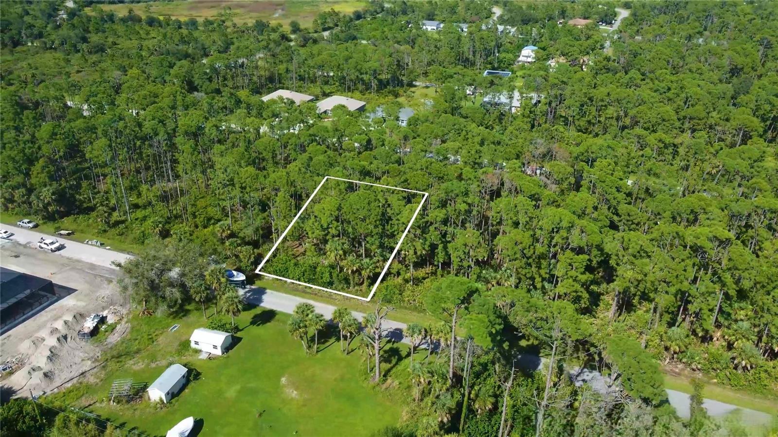 The reviewer has approved this listing. The manager has approved this review. Rephrase Public Remarks to "Discover a tranquil 0.23-acre canvas in Port Charlotte, Florida, where the land is adorned with tall, vibrant trees that sway gently in the breeze. This flat, paved parcel on Matson Lane offers easy access to nearby utilities, with electricity close by, while water and septic solutions await your vision. Located just moments from picturesque parks like Ollie's Pond and Port Charlotte Beach, this inviting space is perfect for creating your single-family home. Enjoy the balance of serene nature and the convenience of urban amenities, all within a short drive to North Port and Punta Gorda. Embrace the potential of this beautiful lot, where your dreams can take root." Add to private remarks "Drone footage available! Property Details APN (Parcel Number): 402106409003 County/State: Charlotte, FL Property City: PORT CHARLOTTEPo Acreage: 0.23 Lot Lines: 88 ft x 114 ft Zoning: Residential, single-family Flood Zone: FEMA maps places this property in a technical flood zone (typical for the area) GPS Coordinates: 27.021944, -82.245278 Road Access: Matson Ln Terrain: Flat, Treed Utilities Power: City Electricity/Power is available on the property and ready for hook up Power Company: Florida Power and Lights Water: A well will need to be installed on the property Sewer/Septic: A Septic Tank will need to be installed Natural Gas: Natural gas and propane requires an on-site tank and fuel delivery Yearly Taxes: $466.02 HOA/POA Dues (Broken up Monthly): Camping / RVs / Mobile Homes Is Camping Allowed?: No. Manufactured Homes Allowed?: No RVs (Recreational Vehicles) Allowed to live in long term?: No