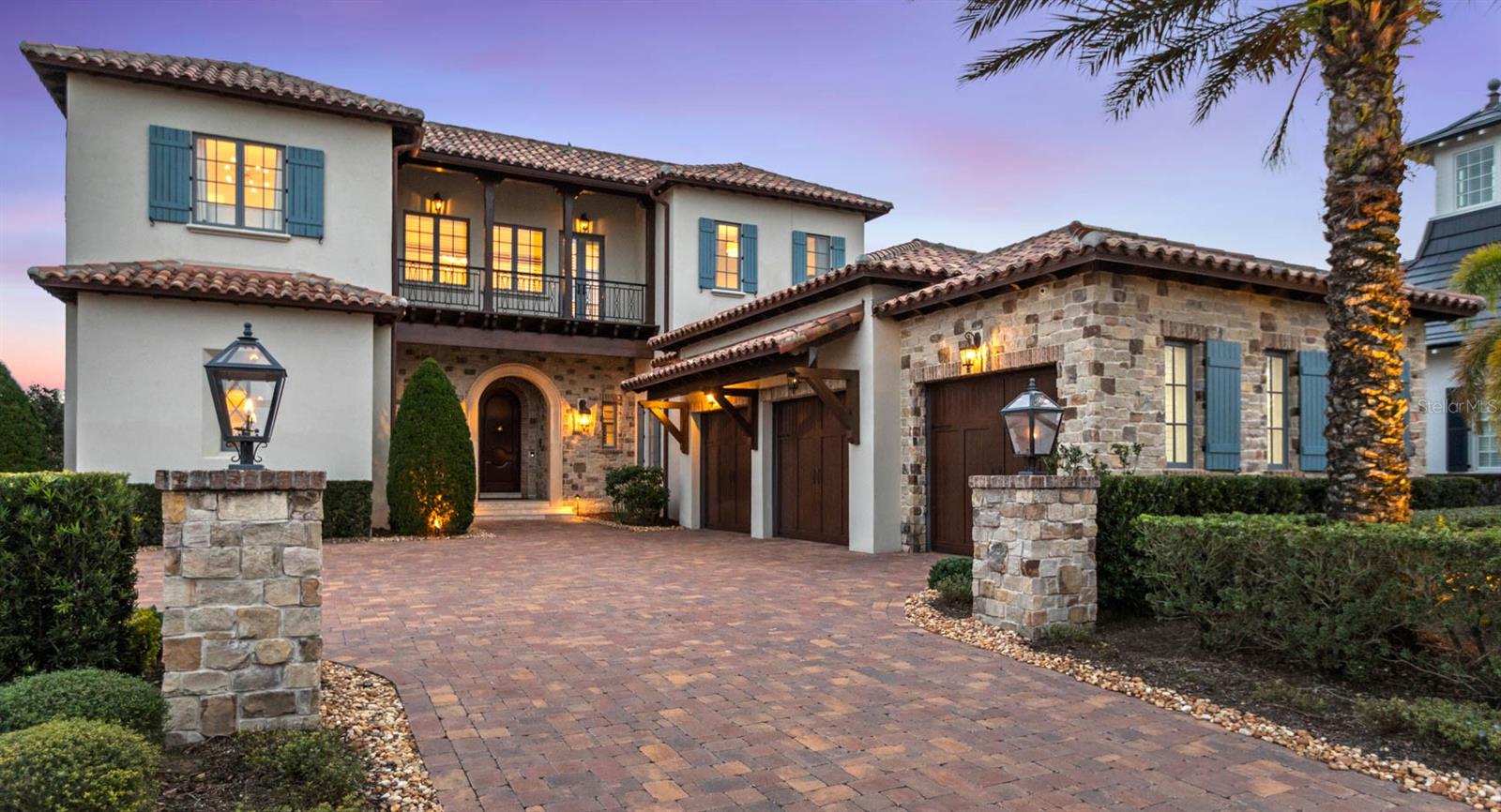 Situated in the sought-after Golden Oak neighborhood, Covina is a timeless blend of elegance and innovation, offering a luxurious lifestyle, mere moments from the magic of Walt Disney World. Built in 2019 by Cahill, this meticulously designed home spans 5,475 square feet, with 5 bedrooms, 5 full bathrooms, and 3 half baths. From the moment you enter, the attention to detail is evident. The grand living room is highlighted by exposed wood beams, creating a warm yet sophisticated ambiance. The first-floor primary suite is a private retreat featuring a morning bar, soaker tub, dual vanities, a massive walk-in closet and access to the pool area, ensuring ultimate comfort and convenience. Designed for effortless entertaining, Covina’s open floor plan flows seamlessly into its outdoor oasis. The covered lanai boasts an outdoor kitchen, complete with roll-up screens for year-round enjoyment. The oversized pool features a sunken bar, while the casita offers serene views and privacy for guests. The second floor offers 3 full ensuites, a spacious loft for added flexibility, a second laundry room, and elevated outdoor space. Some of the modern conveniences inside the home are a Crestron system that includes surround sound, security cameras, and a Tesla charger. throughout the home. Offered fully furnished, Covina’s interiors reflect impeccable taste, complementing the home’s architectural charm. Golden Oak residents enjoy exclusive access to resort-style amenities, concierge services, and proximity to Walt Disney World. Call today for more information or to set up a private showing!