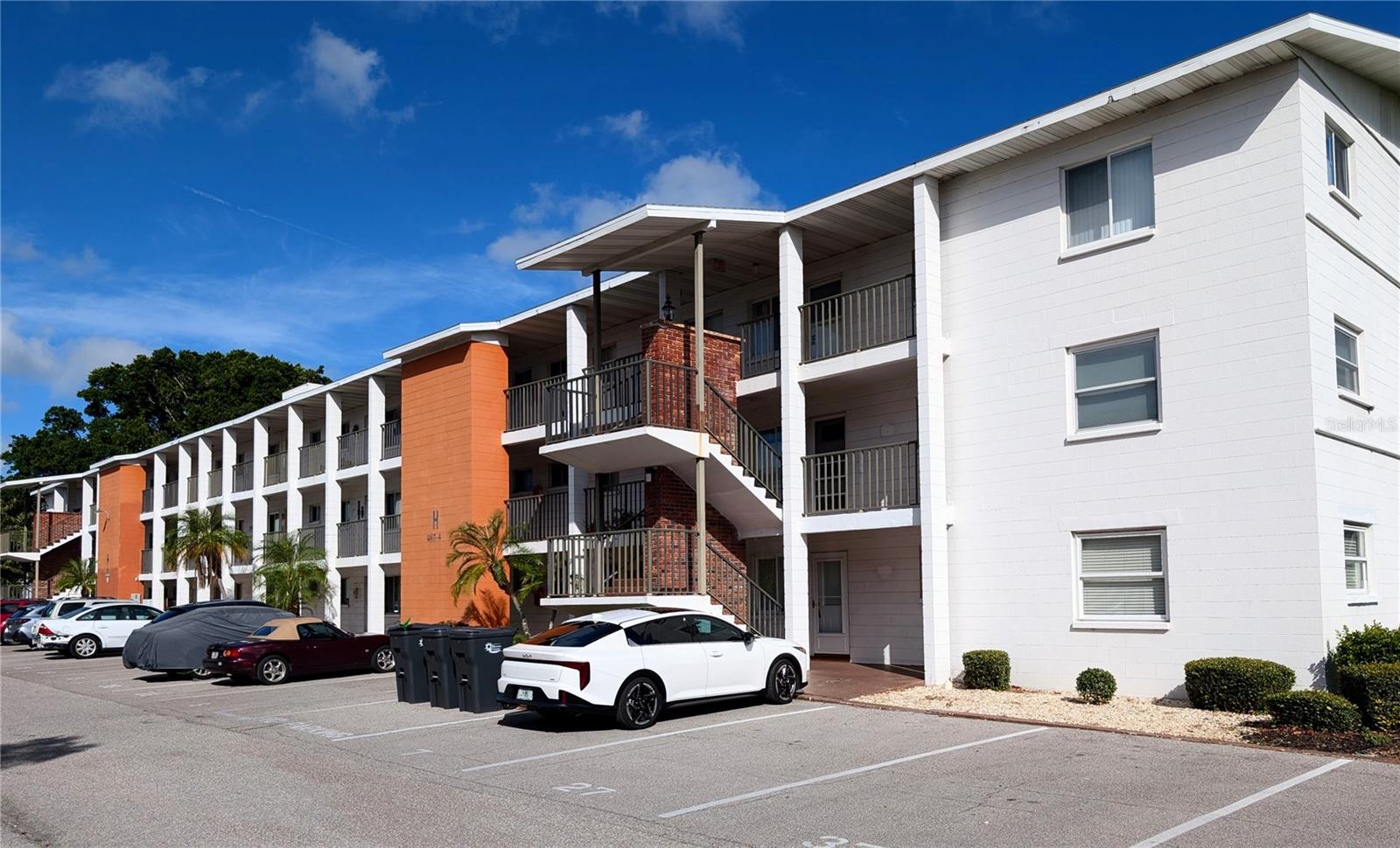 If you enjoy a nice walk around a beautifully landscaped courtyard you will definitely enjoy walking out your back door. There are sidewalks along the perimeter  of the courtyard where you will stroll by the nice heated pool, shuffleboard courts, and the very active clubhouse.  There are benches to sit on and a grilling area called "Friendship Square" where you will enjoy visiting with your neighbors. Once you enter the front door of this ground floor end unit condo you will notice how spacious  the floor-plan seems. The kitchen is definitely large enough for anyone who loves to cook and entertain. There are many nice updates here including the windows, the front doors, the patio enclosure, the bathrooms, newer carpeting, and there is a hot water on demand installed making heating your water very fast. The furnishings are very comfortable and newer so no need to spend extra cash before moving in, it's all here. The Fourth Bayshore is centrally located to some of the best rated beaches in the Nation including Anna Maria Island and Siesta Key where you will find so much fun stuff to do throughout the year. Both Downtown Bradenton and Sarasota are a short drive away where you will find excellent dining, museums, live theaters, gardens, farmers markets and so much more. This home is perfect for either the snow bird escaping the winters or as a full time resident looking for a great place to call home.