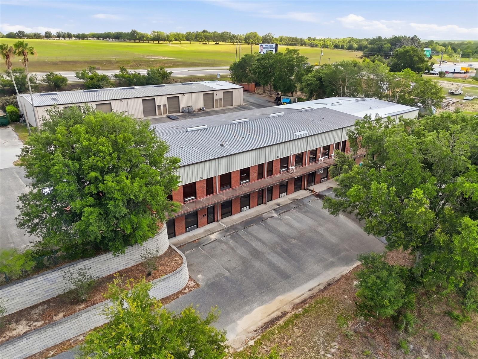 SUNEAGLE COMMERCE PARK CONDO UNIT 100 - Commercial Sale