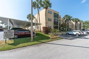 Lowest priced in the Entire Complex!  This 1 Bedroom, 1 Bath condo in the much desired WatersEdge 55+ Community.  Winterized lanai adds perfect amount of square footage.  Whether looking for a winter retreat or a full time home,  this Community has it all.  WatersEdge  is beautifully maintained and conveniently located near shopping, dining, and major roadways, with quick access to Walsingham Road and Indian Rocks Beach. Perfect for full-time residents or seasonal snowbirds seeking a low-maintenance coastal lifestyle. **HOA fee covers cable, internet, phone, water, sewer, trash, grounds maintenance, pool maintenance, and exterior building maintenance. ** No Special Assessments + Milestone Inspection completed and passed!!  Flood Zone X - Does not require flood insurance.