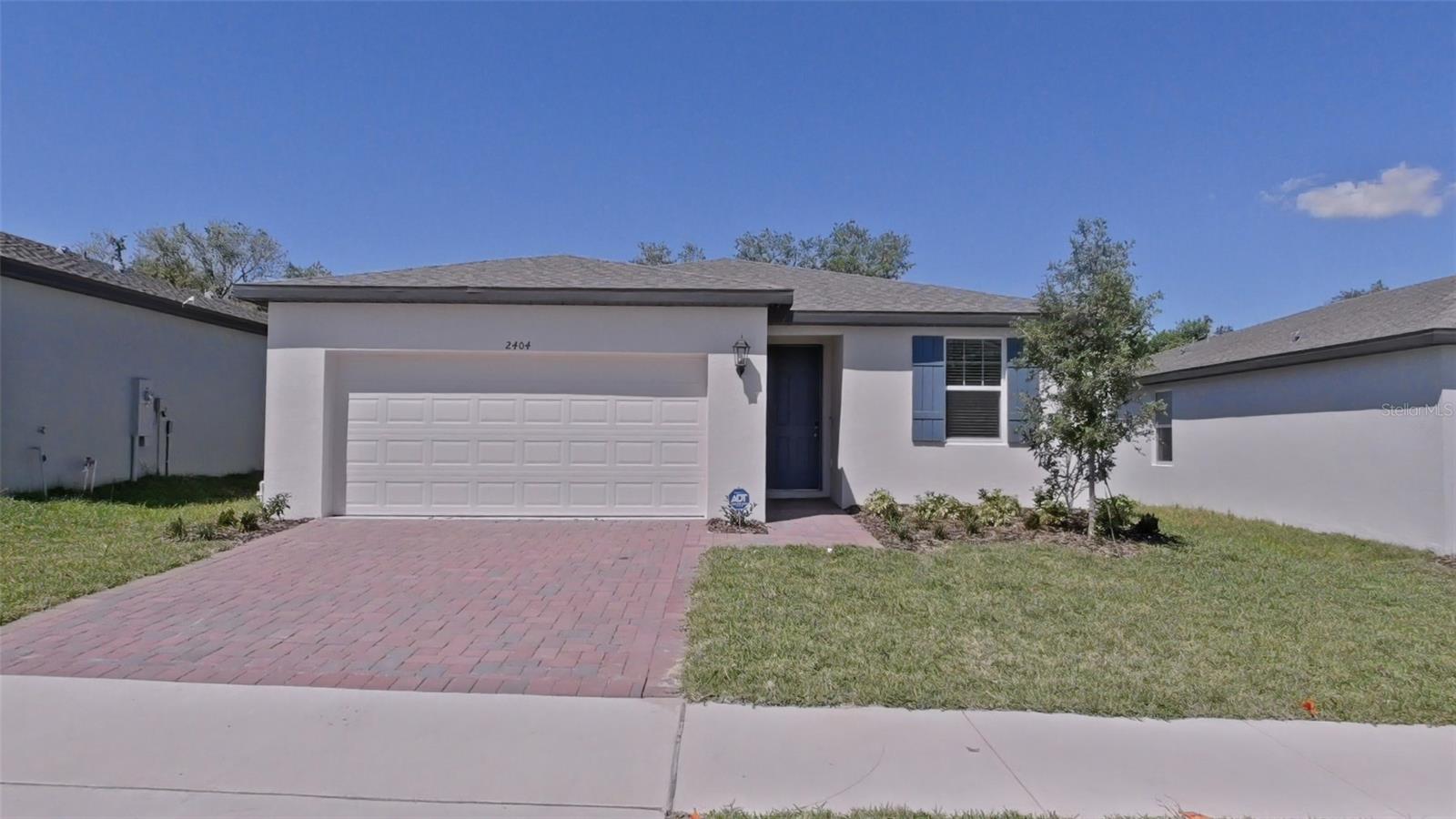 Welcome to your new home at 2404 White Tail St. in Davenport, FL! This stunning residence features 3 bedrooms, 2 baths, and a host of modern amenities. The spacious kitchen boasts stainless steel appliances, granite countertops, and overlooks the inviting great room. With a washer and dryer included, moving in is a breeze! Located in the sought-after Deer Run community, you'll enjoy easy access to US-27 and I-4,