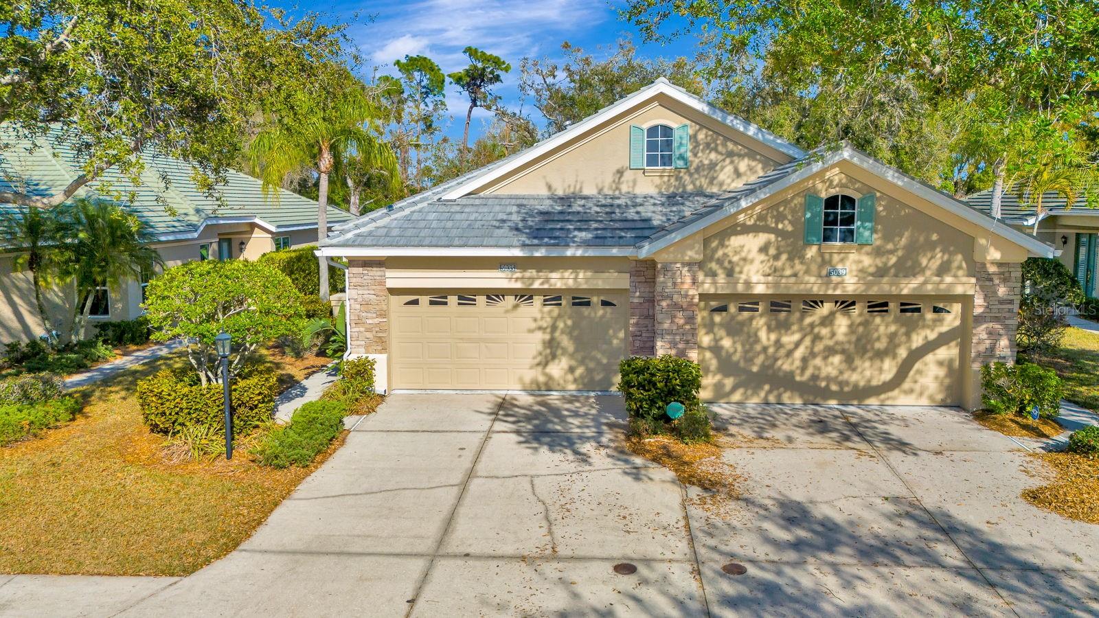One or more photo(s) has been virtually staged. Welcome to this stunning, fully remodeled villa located in the desirable Avalon Community at The Villages of Palm Aire. Renovated from top to bottom — from the roof all the way down to the flooring — this home offers the perfect blend of comfort, style, and tranquility. This spacious two-bedroom, two-bathroom villa features a desirable split-bedroom floor plan for added privacy. The open-concept kitchen overlooks the living and dining areas, creating a bright and inviting space ideal for entertaining or relaxing. The kitchen showcases high-end granite countertops, new wood cabinetry, and a clean, modern design. The primary suite offers luxury carpet flooring, a walk-in closet, and a beautifully updated walk-in bathroom. Both bathrooms have been fully renovated with quality finishes. Enjoy maintenance-free living in this peaceful, gated community featuring a heated pool and beautifully maintained grounds. Optional membership at Palm Aire Golf & Country Club is just minutes away for golf and social enthusiasts. Conveniently located, just minutes from UTC Mall for dining, shopping, and entertainment. Approximately 10–15 minutes to Sarasota-Bradenton International Airport. Whether you’re looking for a seasonal retreat or full-time Florida living, this villa delivers comfort, convenience, and value. Priced to sell — bring your offers!