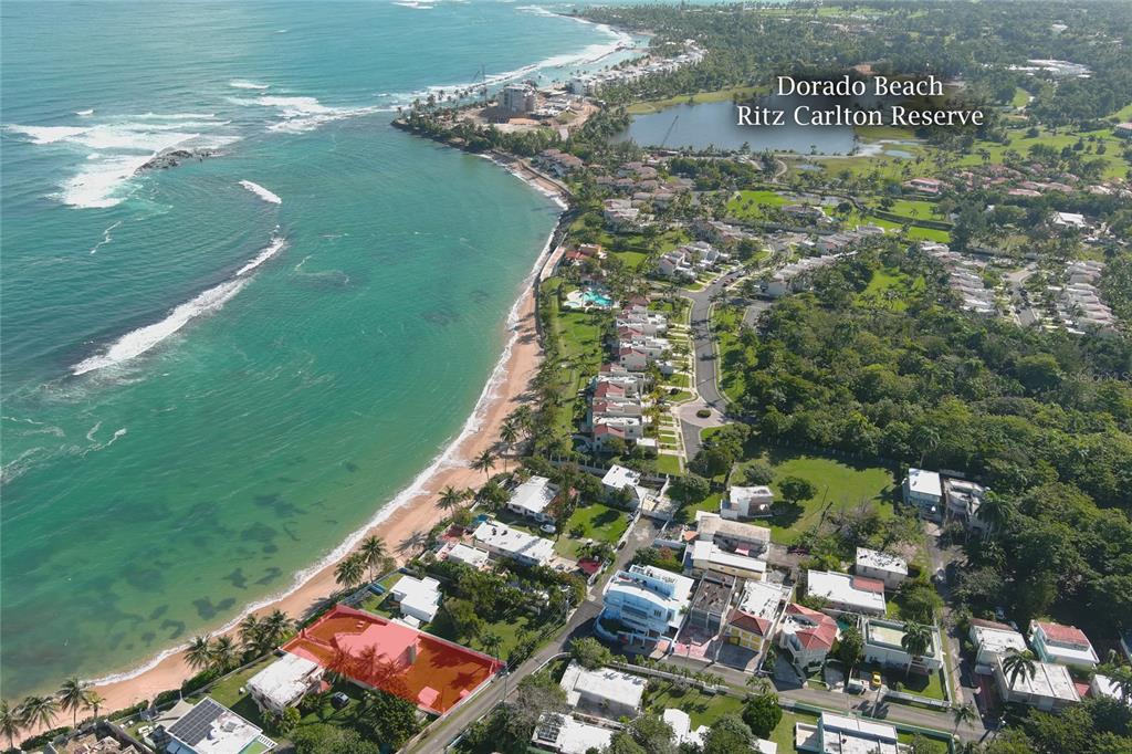 Enjoy a lifestyle like no other in this unique beachfront house nestled on a secluded beach between the Ritz Carlton DORADO BEACH resort and the upcoming new Ritz at the old Cerromar hotel property.  Renovate this charming home into the house of your dreams with a beautiful sandy beach right at your door step. With a beach protected by a natural reef right in front of your house, you can practice infinite aquatic sports such as surfing, paddleboard,  kitesurfing, scuba and snorkeling right in your own backyard.  BRENAS ESTATES has long been an exclusive local beach community and is living a revival as many homes are being renovated or newly constructed. This beachfront house in a gated community, with 24 hour security, has the most privileged location right between the two Dorado Beach properties.