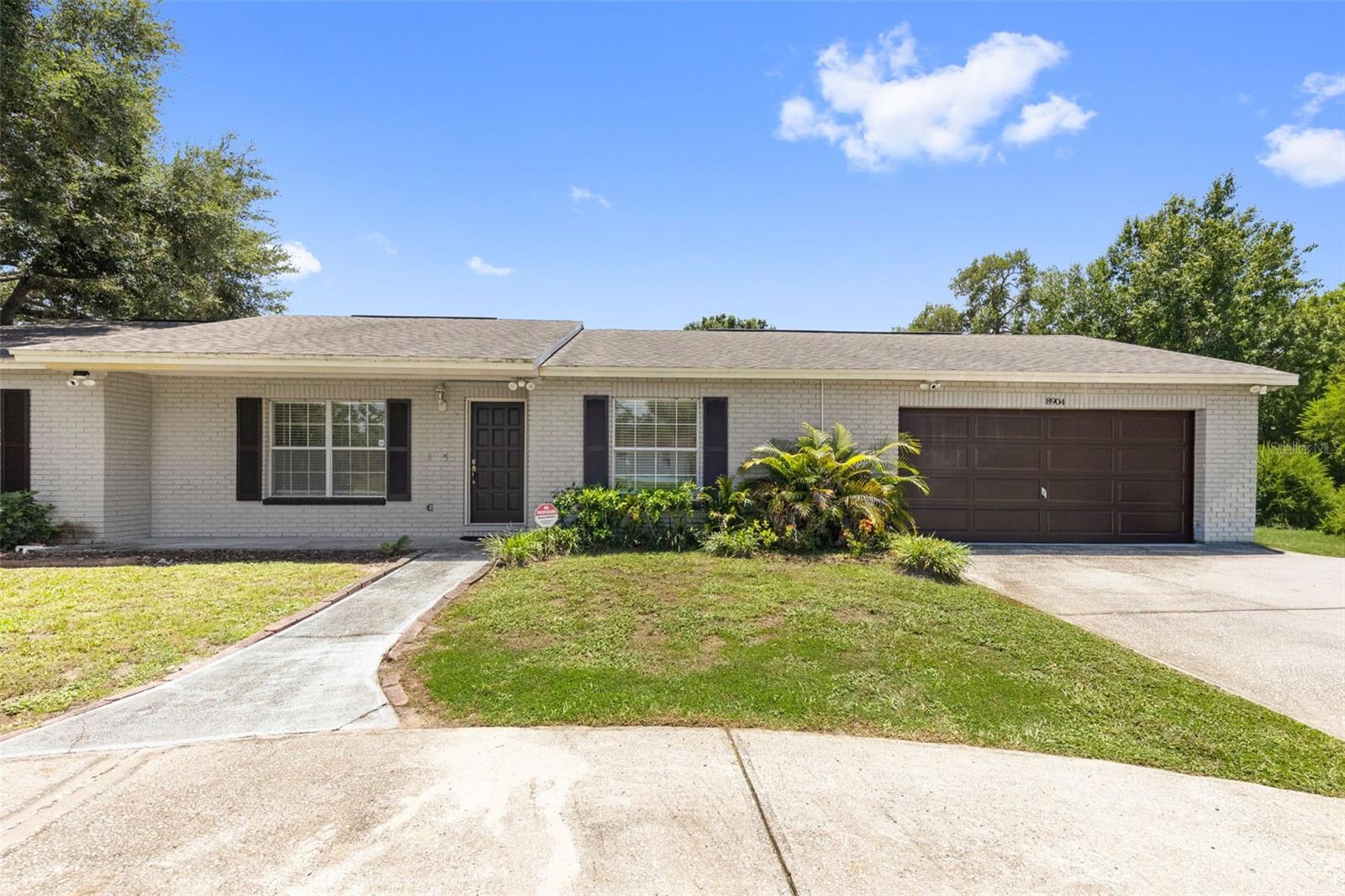 Welcome to this spacious move-in ready 4-bedroom, 3-bath home in the heart of Tampa's desirable Town 'n' Country neighborhood. Immaculately maintained and thoughtfully updated, this spacious residence offers the perfect blend of modern comfort and functional design. The expansive open-concept living area flows seamlessly into a generously sized kitchen with abundant workspace, pantry, and adjacent dining area, making it ideal for everyday living and entertaining. The private primary suite is tucked away from the secondary bedrooms and features a walk-in closet and multiple bath areas for added comfort, while three additional bedrooms provide flexibility for family, guests, or a home office. A standout feature is the incredible 36-foot screened porch, offering the perfect place to relax, dine, or entertain while enjoying Florida's beautiful weather year-round. An oversized 21' x 20' garage provides plenty of room for vehicles, storage, or a workshop. Ideally situated with quick access to Tampa International Airport, downtown Tampa, major highways, shopping, dining, waterfront parks, boating, and the Gulf Coast's world-famous beaches, this home delivers both convenience and lifestyle. Clean, stylish, and truly turnkey, this exceptional property is ready for its next owner to move in and start enjoying their Florida life-style.