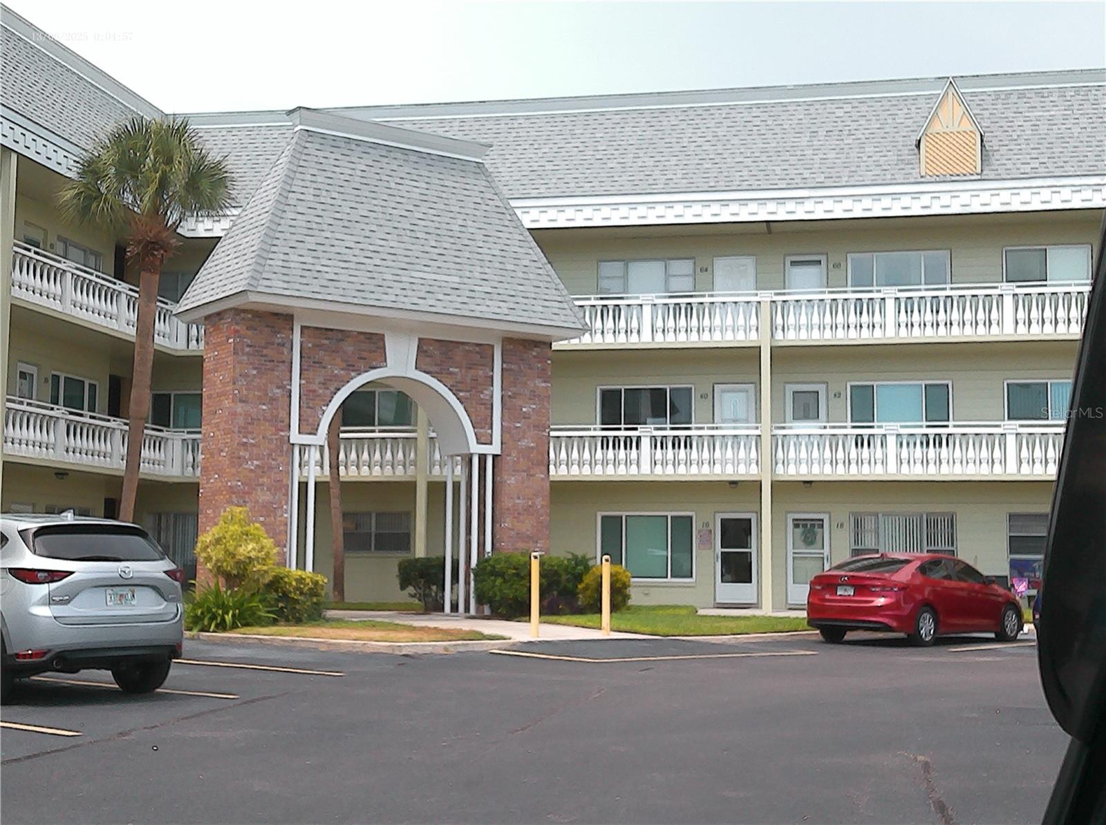 Ground Floor, parking in front, inside laundry.
