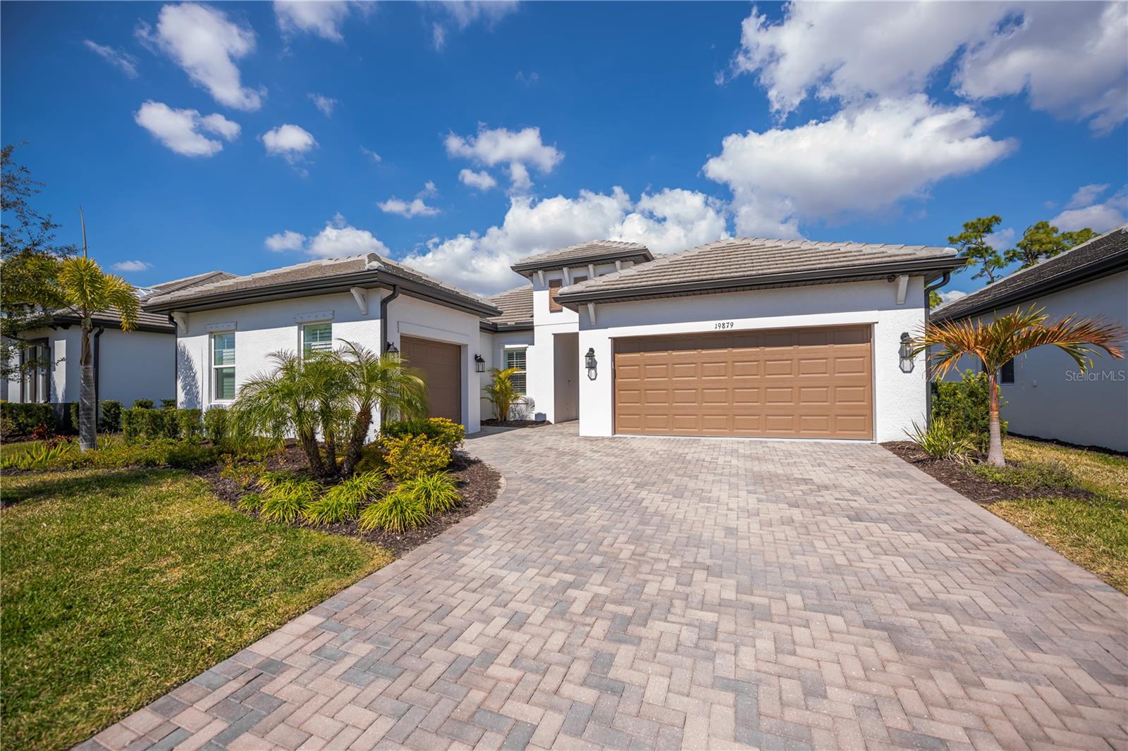 Priced to sell!  This impressive POOL home features 4 bedrooms, 3 baths,  flex space, and  3-car garage in the gated community of Oasis. Built by MI Homes, this residence centers around an open-concept layout that seamlessly connects the kitchen, living, and dining areas — perfect for both everyday living and entertaining.
Some of the key features of this home include a 60-foot lot, tall ceilings, tray ceilings, crown molding, upgraded baseboards, plantation shutters, ceiling fans, and tile flooring throughout the entire home.
The kitchen is a true showstopper and features a gourmet design with stainless steel appliances, a stainless hood, large walk-in pantry, coffee bar, oversized island with sink, and upgraded quartz countertops.  Just off the kitchen and living area, sliding glass doors open to your private lanai featuring expansive panoramic screening, a HEATED SALTWATER POOL and SPA with tranquil water features and colorful nighttime lighting, plus a sun shelf perfect for lounging — all overlooking peaceful, picturesque pond views.
The primary bedroom suite offers a very large walk-in closet with custom built-ins, stunning views of the pool and pond, and a modern en-suite bathroom with dual sinks. The remaining bedrooms are thoughtfully positioned on opposite sides of the home, offering privacy, built in closets and each has access to its own bathroom.
Residents of Oasis enjoy exclusive access to amenities, including a heated community pool, pickleball courts, clubhouse, scenic walking paths leading to a park and dog park — all within a maintenance-free, gated setting.
Located in highly sought-after Wellen Park, you are just minutes from Gulf beaches, shopping and dining, entertainment, schools, medical facilities, the Atlanta Braves Spring Training facility, and the new Wellen Park Costco.
Don’t miss the opportunity to make this exceptional home yours!
