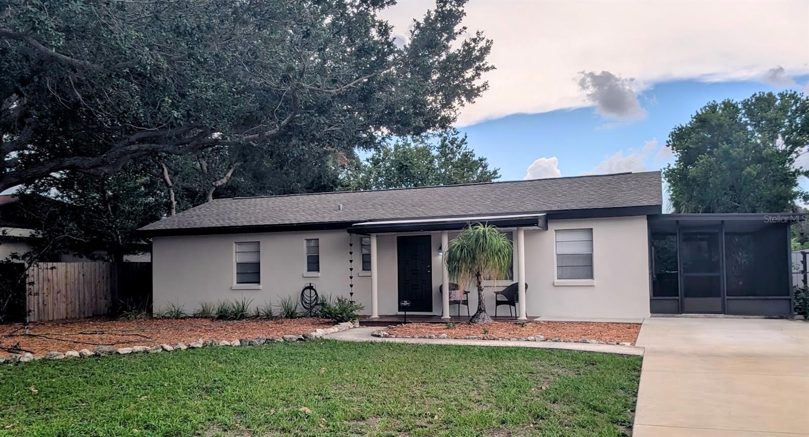 Charming 3-bedroom, 2-bath South Tampa home! Roof, HVAC, and water heater, kitchen cabinets and counters all new in 2021. Features a large family room and open kitchen area. Enjoy extra living space with a bright sunroom, screened porch, and a utility room featuring a 2023 washer and dryer. Move-in ready with modern updates and plenty of cozy spaces to relax. Located in Flood Zone X (no flood insurance required), close to Macdill Air Force Base, Crosstown Expressway, Gandy Bridge, Westshore Marina District, Bayshore Blvd and Downtown Tampa.