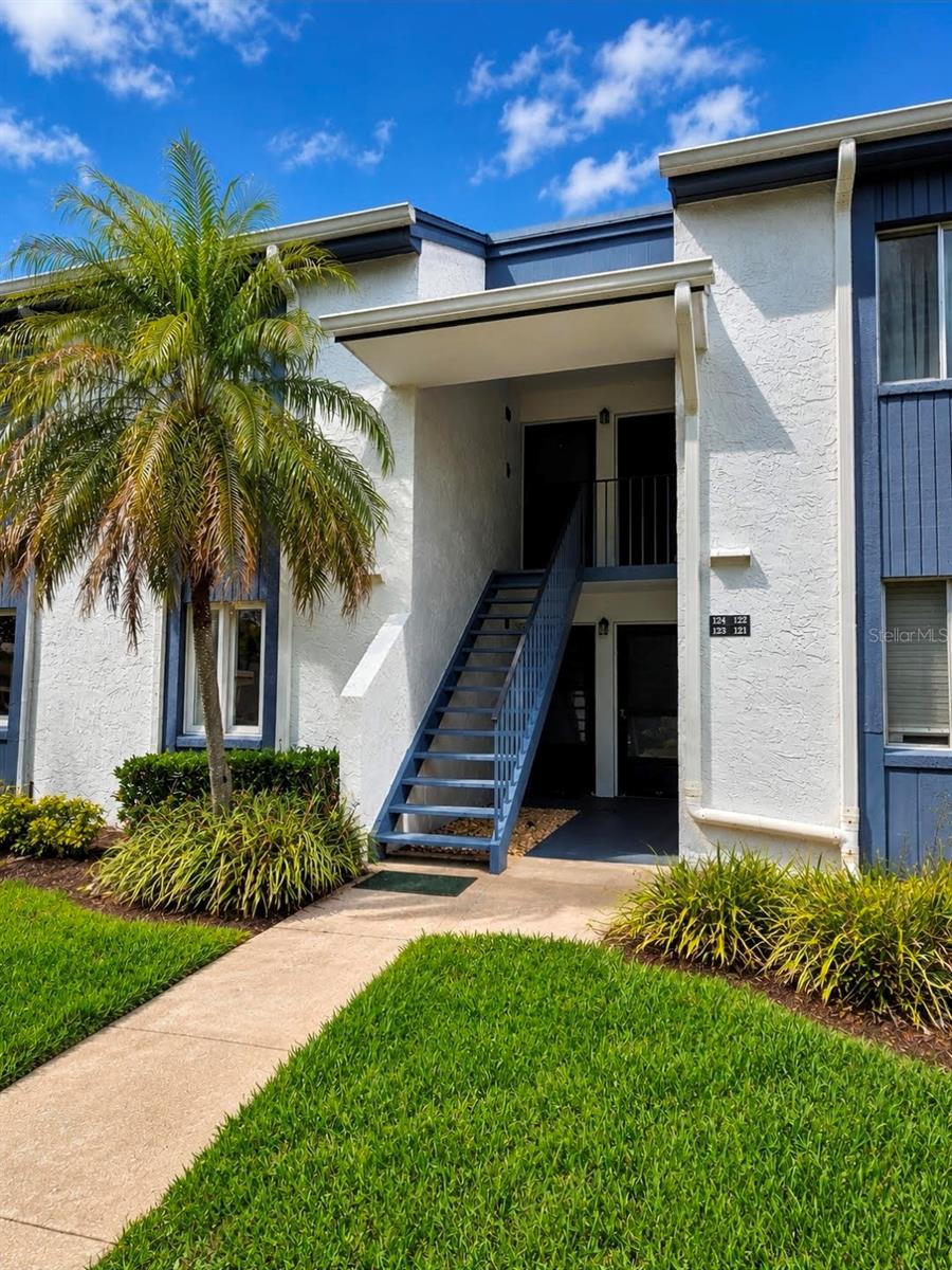 Priced to Sell at $159,900! Opportunity knocks in the gated community of East Lake Woodlands. This first-floor 2-bedroom, 2-bath condo offers 1,053 square feet of living space and is ready for its next owner to bring their vision to life.

Perfectly positioned on a private conservation lot with no rear neighbors, this home offers a peaceful natural setting rarely found at this price point. Enjoy your morning coffee from the screened lanai while taking in tranquil wooded views instead of looking into another building.

Featuring a spacious split-bedroom floor plan, open living and dining areas, in-unit laundry, and assigned covered parking, this property provides an excellent foundation for renovation and customization. While the interior remains largely original, the electrical panel has already been updated, providing a valuable improvement for future updates.

Residents enjoy the security of a 24-hour guard-gated community, beautifully maintained grounds, a community pool, and optional membership opportunities at the East Lake Woodlands Country Club featuring golf, tennis, pickleball, fitness facilities, dining, and social events.

Monthly condo fees include cable, internet, water, sewer, trash, exterior maintenance, building insurance, roof maintenance, landscaping, and community amenities.

Conveniently located near shopping, restaurants, Tampa International Airport, and Florida's award-winning Gulf Coast beaches, this condo presents an exceptional opportunity for a primary residence, seasonal retreat, or future investment property. Being sold As-Is and priced for a quick sale.