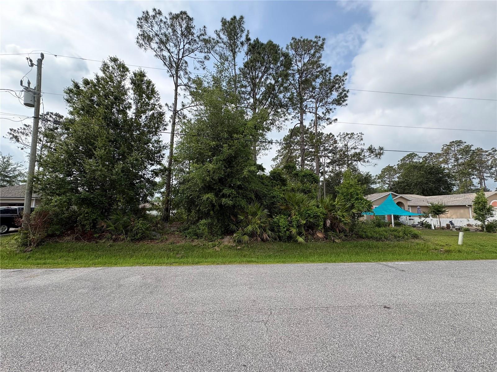 Don't miss this fantastic opportunity to own a beautiful vacant homesite at 21 Renfro Lane in Palm Coast, Florida. Located in a quiet, established neighborhood, this property is ready for your vision—whether you're building your forever home, a seasonal retreat, or your next investment property.
One of the biggest advantages of this lot is NO HOA, giving you the freedom to build and enjoy your property without the restrictions and fees often found in planned communities. Plus, public water and sewer connections are available, making the building process more convenient.
Palm Coast offers the perfect blend of natural beauty and modern convenience. You'll be just minutes from shopping, restaurants, healthcare, parks, golf courses, and the area's stunning Atlantic beaches. Outdoor enthusiasts will appreciate the miles of walking and biking trails, nearby boating and fishing opportunities, and the relaxed coastal lifestyle that makes Palm Coast such a desirable place to call home.
Whether you're ready to build now or invest for the future, this lot offers the flexibility, location, and lifestyle you've been looking for. Bring your builder and start creating your own piece of Florida paradise today!