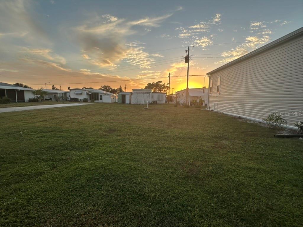 Build your Florida home on this interior lot located in the well-established 55+ waterfront community of Harbor Cove. This lot offers a great opportunity to create a custom home in a relaxed, resident-owned setting. Building packages are available, providing a convenient path from purchase to completion. Harbor Cove features a wide range of amenities, including a marina with optional dock space, clubhouse, swimming pool, fitness center, and an active calendar of social events. Ideally situated near shopping, dining, beaches, and historic downtown Venice, this interior lot is well suited for either seasonal or full-time living.