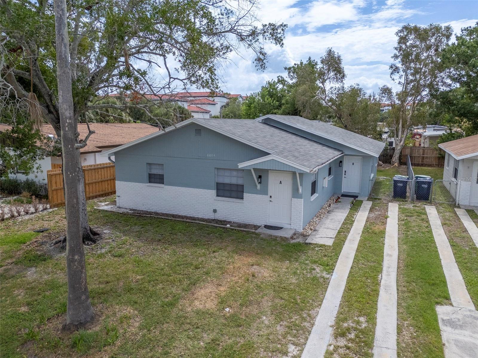 Three investment properties sitting side by side on a quiet dead-end street in Port Tampa provide a great opportunity for an investor looking to collect land. Each unit holds 2 bedrooms, 1 bathroom, and a laundry room. The property to the north of 6604 Faul Street, 6602 Faul Street, is also currently for sale allowing someone to purchase over half of this street. Recently rehabbed all 6 units have brand new appliances, including a stove, refrigerator, and water heater. 6608 Faul Street also includes microwaves. Plumbing and electrical updates have been made. The air conditioning units in 6694 and 6606 were installed in late 2024. The front units have a laundry room accessed via an exterior door along the side of the property. The back units access the laundry room from the kitchen. The washer and dryers convey in all units except 6608 A. The back units also include a very large, private backyard accessed from the laundry room. New bathroom vanities, kitchen counters, and kitchen cabinets have been installed. 6608 Faul Street has brand new window and wall units installed in each bedroom as well as the living room. Off street parking is available for all units except for 6604 A. All units are occupied and leases are available upon request.