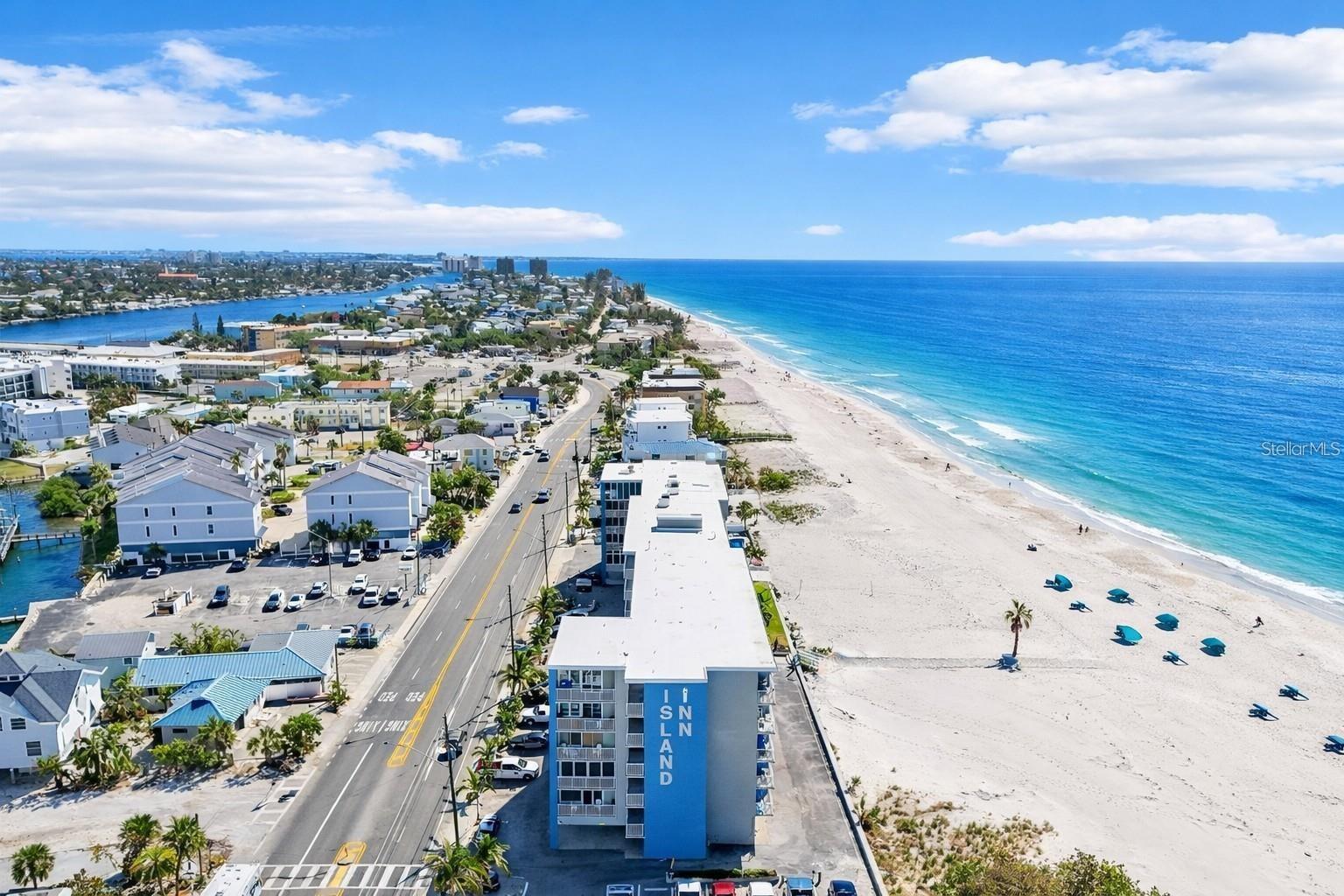 “TOP PRODUCER" Direct Gulf Front Exclusive Studio Condo/Hotel with stunning views of the Gulf of Mexico, perfectly situated on one of the finest beaches. Tastefully designed to blend comfort with the relaxed charm of beach life. Nicknamed "It's a Shore Thing," this getaway lives up to its name, with vacationers rebooking time and again. Year-to-date Vacationer bookings income has reached $38,792.00 and the calendar keeps filling up. Unit is sold Turnkey. Fully furnished: Comfy king bed with newer comfy mattress/newer mattress cover, newer pillows and allergy-protection/organic pillow covers, Newer pull-out sofa with upgraded double mattress, large dresser, 2 nightstands with 2 drawers each + 2 large drawers at the end of bed, 50” TV & DVD player. Balcony has newer Adirondak chairs, Newer AC (2023), Updated bathroom with step-in Shower, Dual shower head/handheld and overhead and an updated vanity, A dehumidifier, Double pane windows and sliders, Surge protector plug strips, Rolling kitchen cart with drawer and cabinet, closet organizer with labeled shelves and many containers. So many extras! Luggage stand, beach chairs, Iron/Iron Board, throw blanket and sheets, Collapsible plastic laundry basket, DVDs – there are 150+ DVDs (listed in categories in the binder), a variety of books, games/puzzles. This is why “IT"SA SHORE THING” is in such  demand and does as well as it does. A perfect Beachfront blend.
The association is well-managed. Reserve study was completed with fully funded reserves, all milestone repairs completed, and no known upcoming assessments. The exterior grounds are updated and Beautifully Landscaped. Many Resort-style amenities included: Heated beachfront pool with sun deck and tiki bar, beachside lounging, a renovated lobby, plus bayside boat slips, fishing dock, and R/V parking accommodations. Monthly condo fee includes ELECTRIC, Wi-Fi, cable, water, building insurance, maintenance, security, trash, and association reserves Showings available between guests. NOTE: Unit is available June 8th through June 15th for the convenience for showings. Make an appointment for your tour. Thank you.