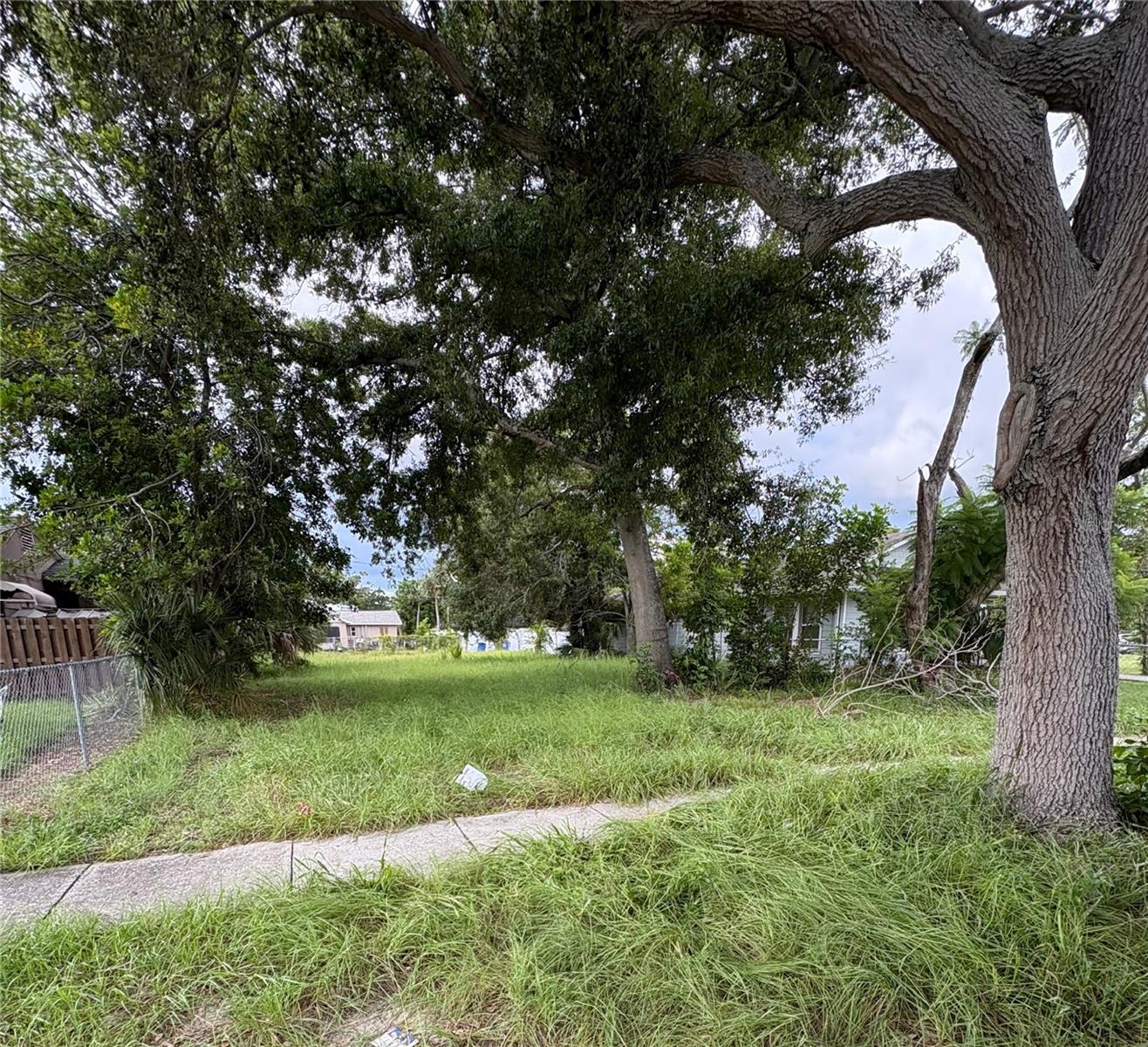 PRICE REDUCTION! Buildable Lot 50x121 Zoned NSM1. Eligible for Single Family home + ADU (Accessory Dwelling Unit perfect for in-laws, a guest space, multi-gen or a separate rental unit) or build a 2 unit multifamily (duplex), all with alley access! Public utilities. Not in a flood zone! Less than a mile away from a golf course and only 3.5 miles to historic Gulfport Beach. Downtown St Petersburg is only 4 miles away with easy access to public transportation. Whether you're a developer, investor or simply dream of the tropical weather you can build to your desire! Buildable lot letter attached.
