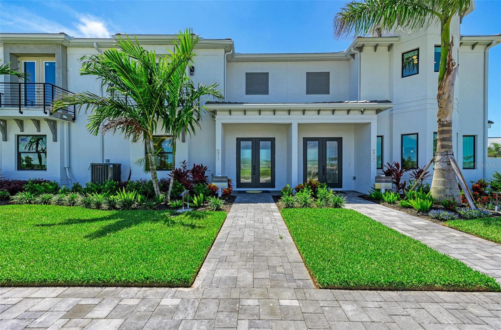 A rare opportunity to own a professionally furnished Medallion Home model in the prestigious gated community of Aqua, one of the area's premier luxury communities. Offered fully furnished, this exceptional residence showcases luxury design, premium upgrades, and impeccable craftsmanship throughout. The thoughtfully designed floor plan features spacious open-concept living areas, elegant finishes, and a stunning gourmet kitchen with premium cabinetry, quartz countertops, a large center island, walk-in pantry, and high-end appliances—perfect for entertaining and everyday living. The luxurious owner's suite provides a private retreat, while additional bedrooms and flexible living spaces offer comfort for family and guests. An elevator adds convenience, and the private courtyard creates an inviting outdoor oasis.

Aqua offers one of the area's most impressive resort-style lifestyles, highlighted by a spectacular 4-acre tropical lagoon with a sandy beach, creating a true vacation-at-home experience. Ideally located near Sarasota Bay, Longboat Key, Anna Maria Island, IMG Academy, and Sarasota-Bradenton International Airport, residents enjoy convenient access to world-class beaches, boating, dining, shopping, and recreation. This move-in-ready furnished model home presents a rare opportunity to own one of the community's showcase residences in one of Southwest Florida's most desirable luxury neighborhoods.