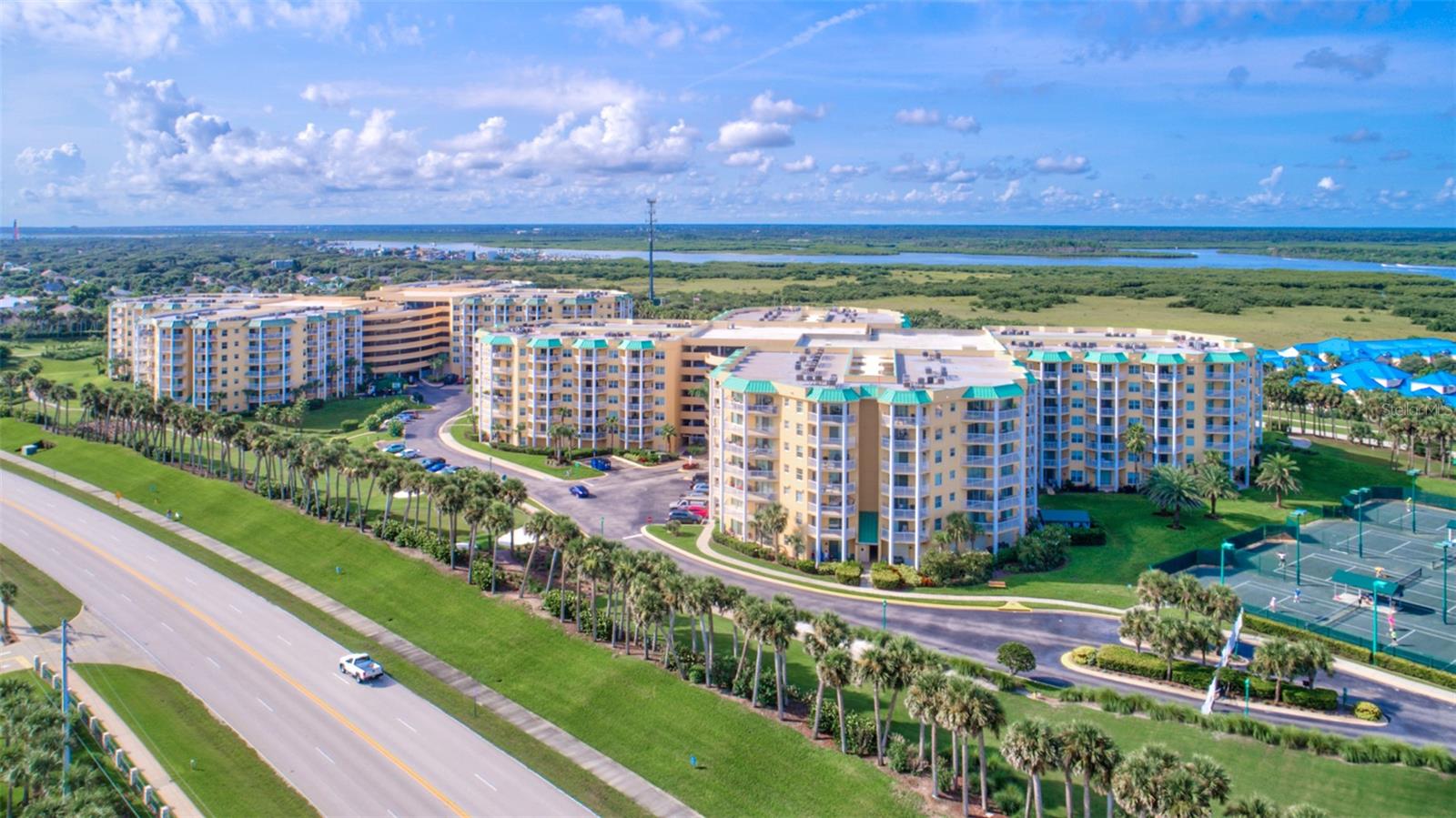 PENTHOUSE floor with PARTIAL OCEAN VIEW, FULL INTRACOASTAL WATERWAY VIEW and GOLF COURSE VIEW in sought after PONCE INLET!! This 2 BEDROOM / 2 BATHROOM TURNKEY CONDO SLEEPS LIKE A 3 BEDROOM with a BUILT-IN MURPHY BED / OFFICE AREA and SIDE TABLE. Fully furnished and equipped, ready to move in. Just pack your bags! ASSIGNED PARKING ON YOUR FLOOR, not underground!! TANKLESS HOT WATER HEATER, HVAC SYSTEM in 2015 and SMART AC/HEAT THERMOSTAT provide assurance and control whether you're at home or away. Plantation shutters provide timeless sophistication & privacy.  Primary suite has large walk-in closet with built-in safe and luxurious spa bathroom.  Coastal paint colors, crown molding & decorative chair rail create a refined yet relaxing coastal retreat. The exclusive HV oceanfront Beach Club puts you right on the beach for a pool/spa, workout, game room, and kitchen. Links Village has a myriad of resort-style amenities including a gated entrance & secure buildings, indoor and outdoor heated pools & spas, social/club room, sauna & fitness center.  You can indulge your love of golfing, boating, beaching, tennis, fishing, fitness workouts, game rooms and nature trails all in the Harbour Village community. River side offers a Pub/Restaurant on-property with service to the outdoor pool area. Access to a beautiful marina with slip rentals or sales and full-time dock master. An equipped fishing pier and boardwalk along the river for sunset walks. On-site management & no pending assessments. Pet friendly with NO weight limit!! See amazing sunrises and sunsets each day!! Steps to the pristine "no drive" sugar sand beach!! Walk or bike to the historic Ponce Inlet Lighthouse & Jetty Park, Marine Science Center, local waterfront restaurants with entertainment, parks, charter fishing, kayak/canoe, surfing, dog park/beach & much more!!