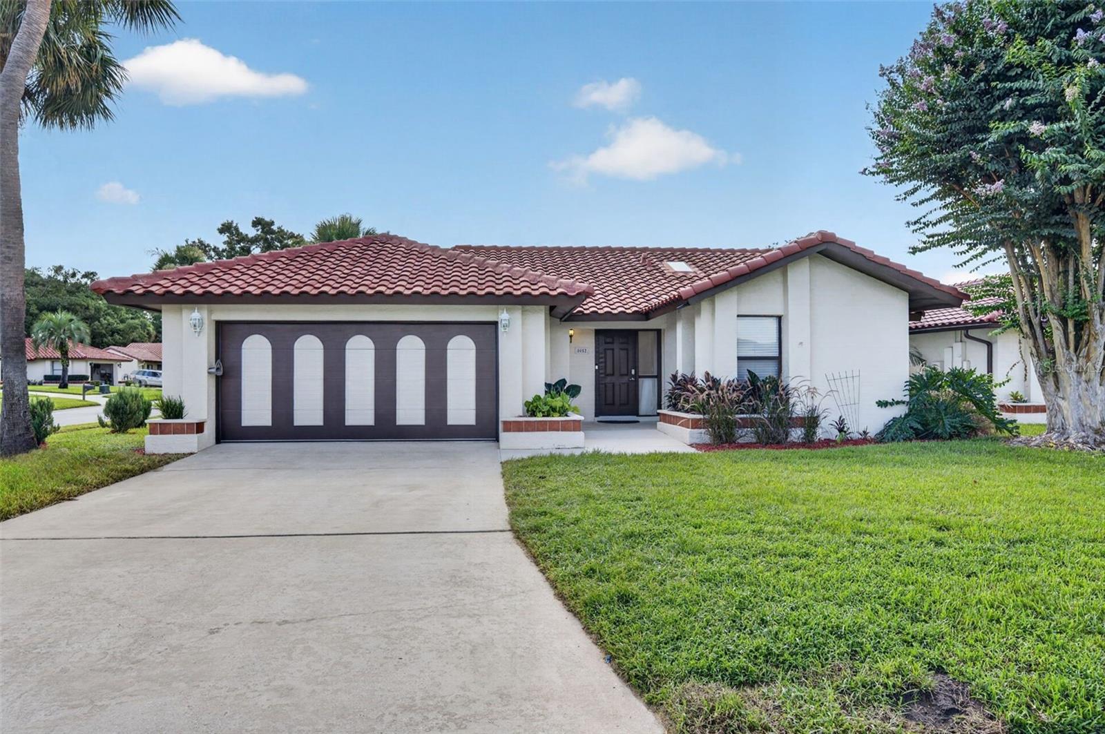 Virtually Staged. 4TH OF JULY SALE! Beautifully updated 3-bedroom, 2-bath corner-lot pool home in the heart of Dr. Phillips! This move-in-ready home features numerous major improvements, including a NEW roof (2019), complete whole-house repipe (2026, NEW A/C (2023), NEW water heater (2024), and a recently remodeled primary bathroom.

The spacious floor plan flows seamlessly to the screened-in pool, creating the perfect space for entertaining, relaxing, or enjoying the Florida lifestyle. The desirable corner lot offers added privacy, curb appeal, and extra outdoor space.

Residents of Granada Villas enjoy maintenance-free lawn care and irrigation provided by the HOA, along with exceptional community amenities including a private boat ramp with access to the sought-after Sand Lake Chain of Lakes, lighted tennis courts and basketball courts.

Located just minutes from Restaurant Row, major highways, Universal Studios and Disney, shopping, dining, and top-rated schools, this home combines location, comfort, and peace of mind with all the major mechanical updates already completed.
Take advantage of this limited-time 4th of July Sale and make this exceptional Dr. Phillips pool home yours! Schedule your private showing today!